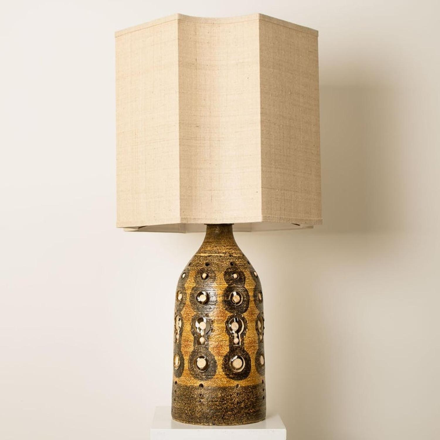 Georges Pelletier table lamps circa 1970, France. Glazed ceramic with decorative designs
With wonderful off white and taupe (silk) shade from Rene Houben.

In very good original condition. Cleaned well wired and ready to use. Each light requires