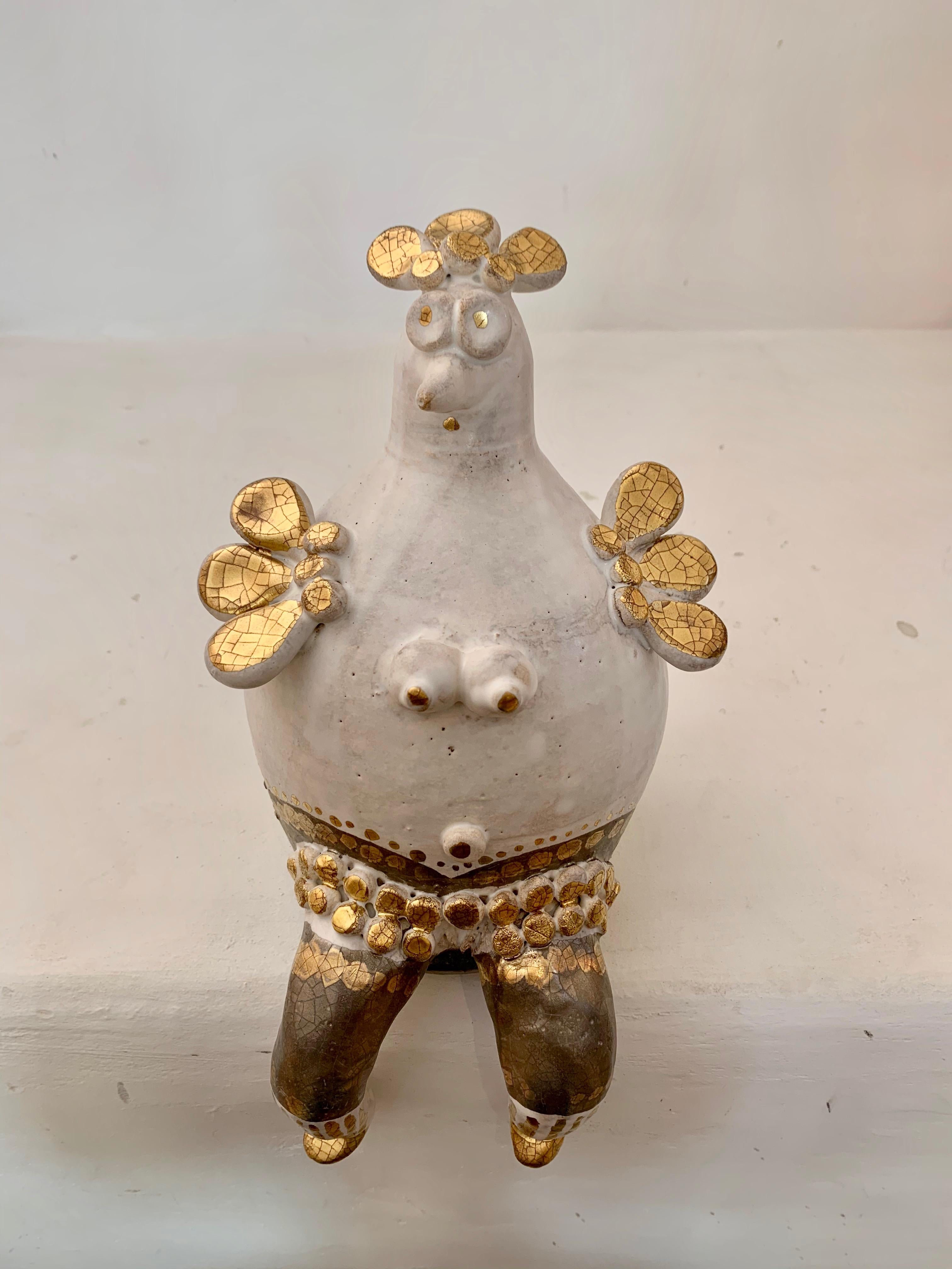 White, gold and platinum enameled ceramic Hen sculpture, signed on the back by the artist, delivered with a 