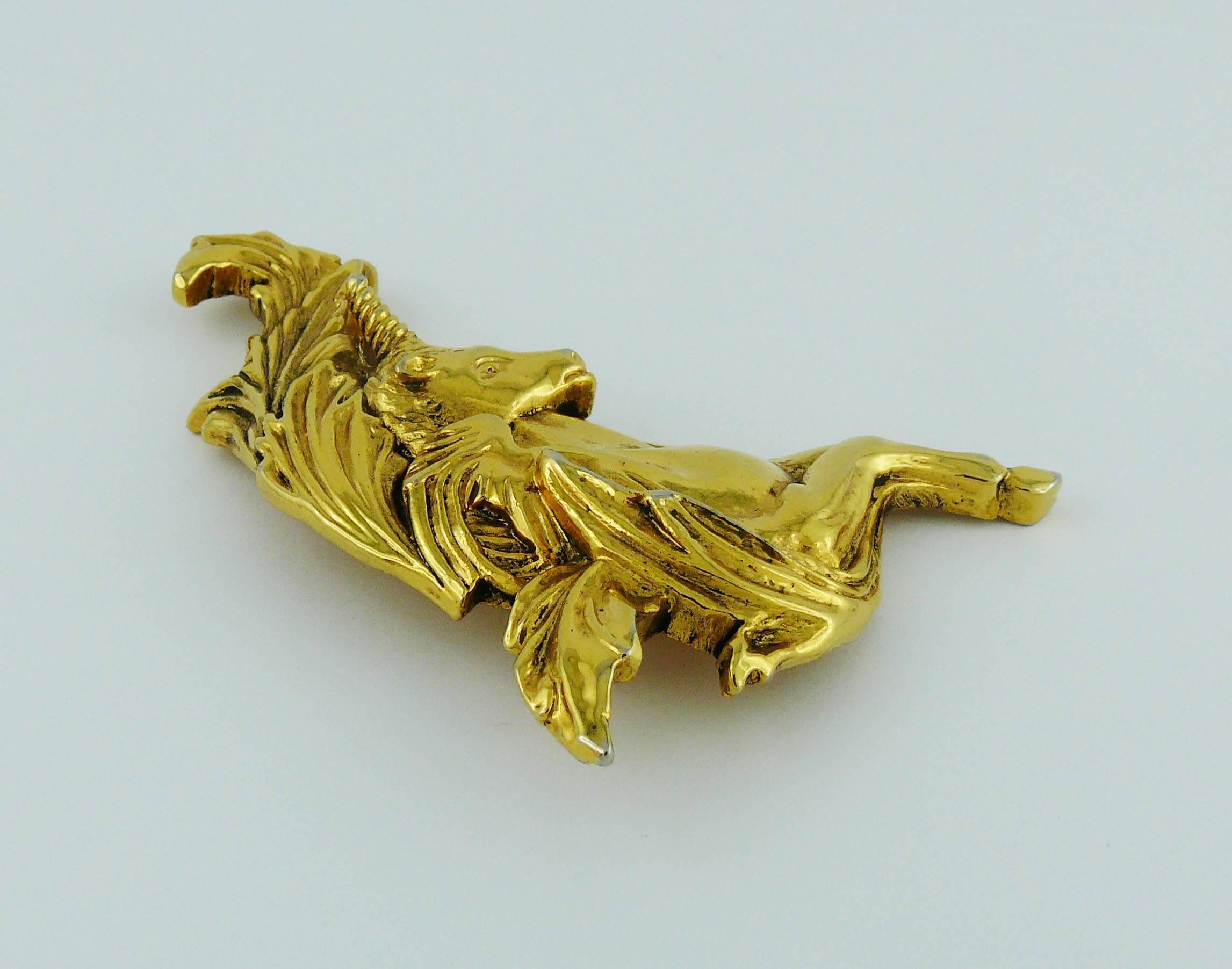 GEORGES RECH Paris vintage gold toned large unicorn brooch.

Embossed G. RECH Paris.

Indicative measurements : max. height approx. 8.4 cm (3.31 inches) / max. width approx. 4.5 cm (1.77 inches).

JEWELRY CONDITION CHART
- New or never worn : item