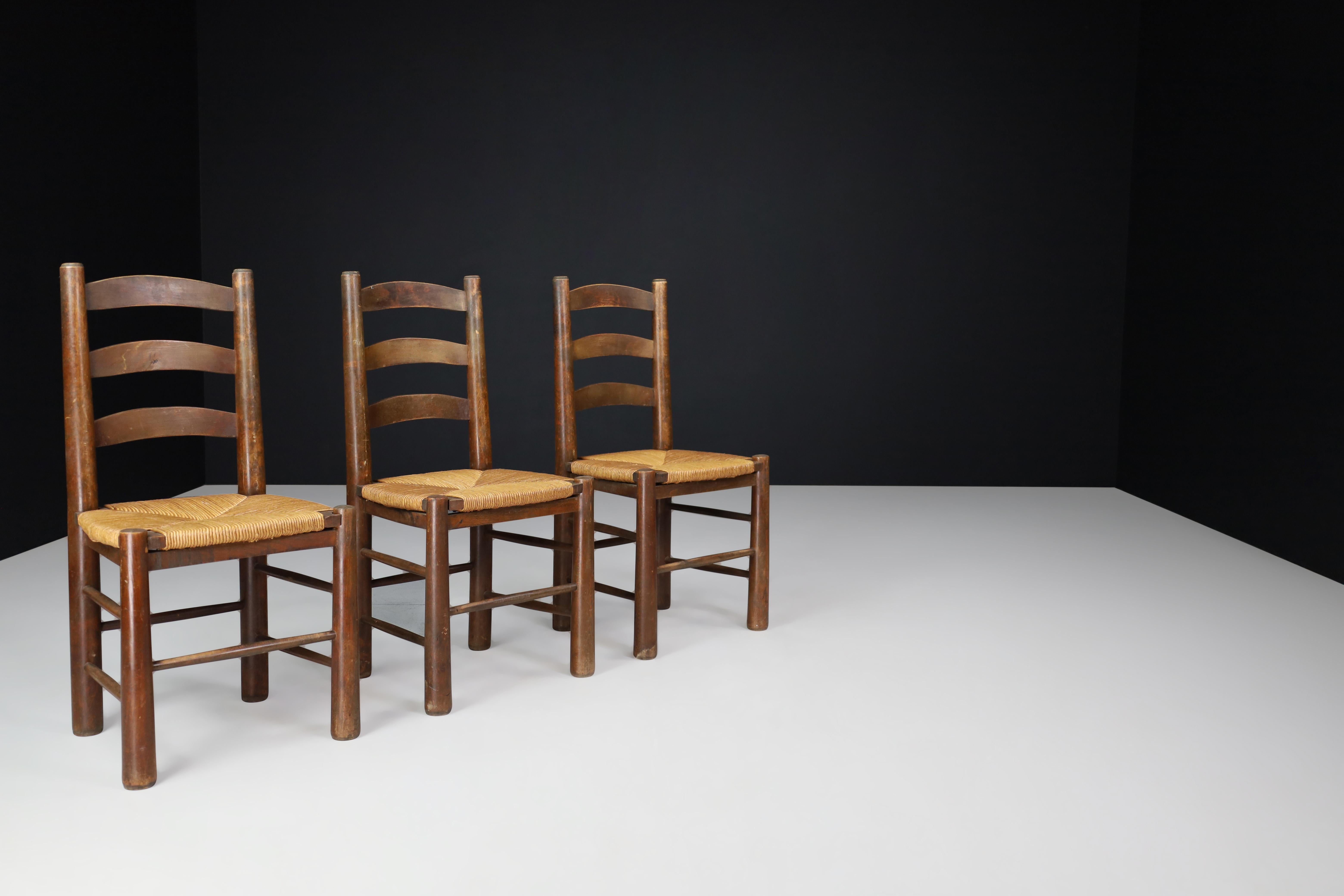 Chaises de salle à manger Georges Robert en chêne et jonc, France, années 1950 Bon état - En vente à Almelo, NL