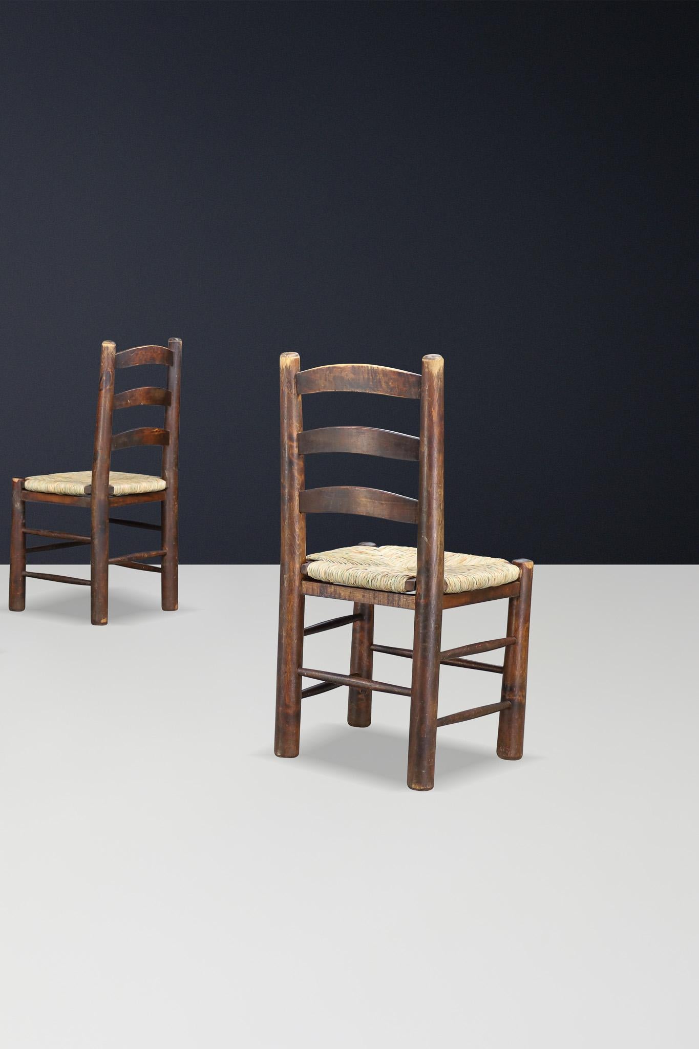 Sillas de comedor Georges Robert en roble y junco, Francia, años 50 en Bueno Estado en Almelo, NL