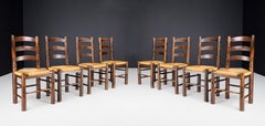 Georges Robert Dining Chairs in Patinated Oak and Rush, France, 1950s