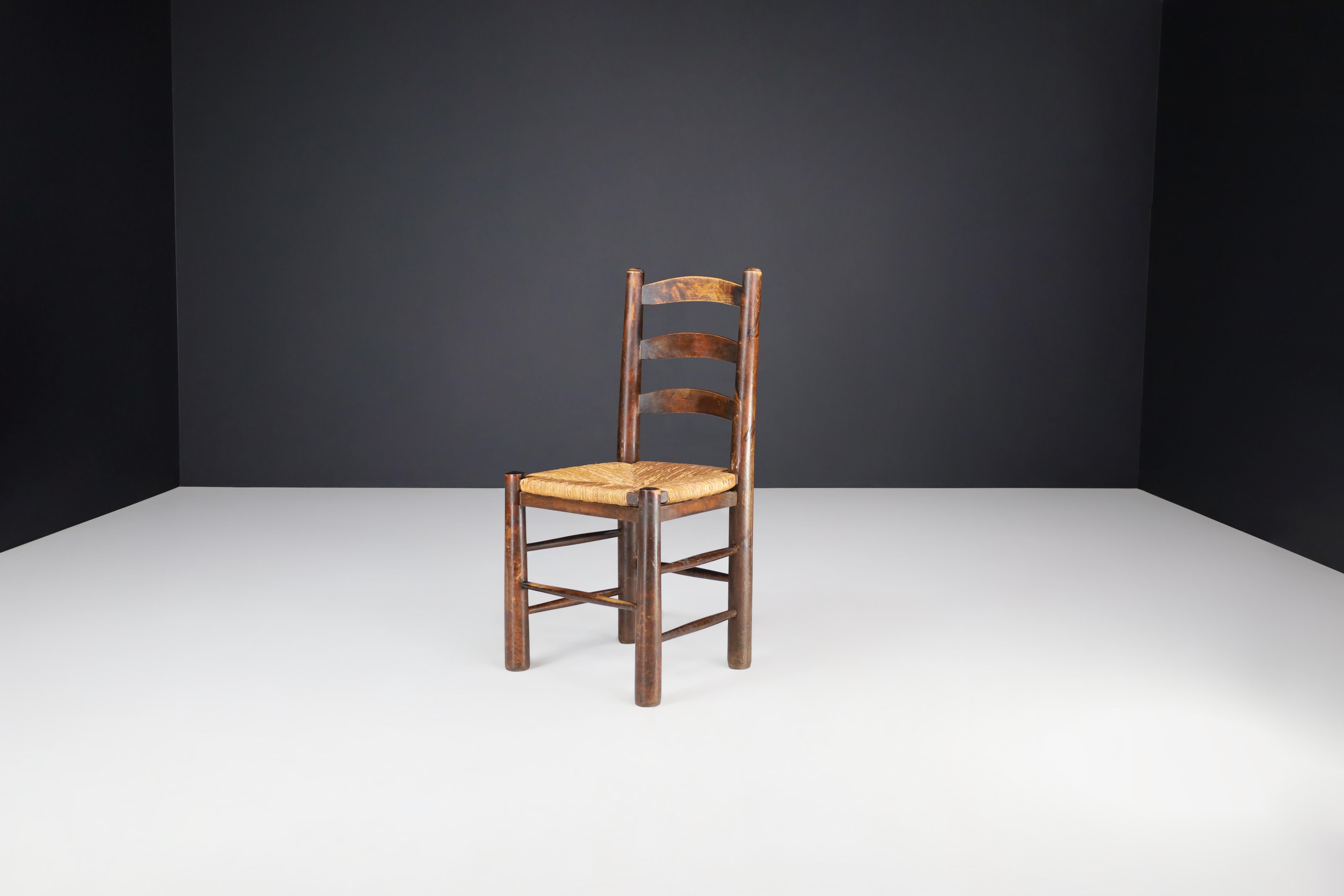 Georges Robert Dining Chairs in Patinated Oak and Rush, France, 1950s In Good Condition In Almelo, NL