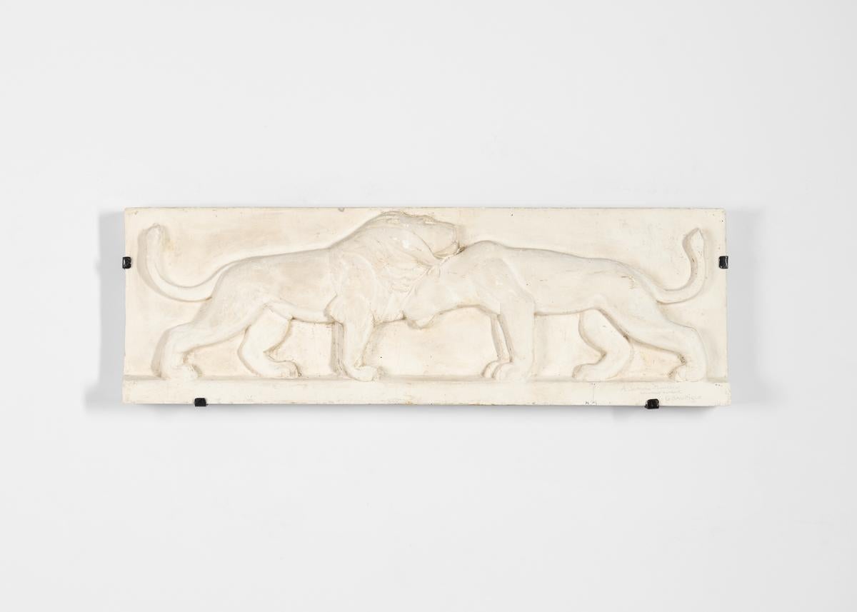 The sculptor Georges Saupique is especially noted for his large-scale, carved bas-reliefs, often of animals, that reflect France's cultural and colonial power. He undertook both public and private commissions, including creating four reliefs for the
