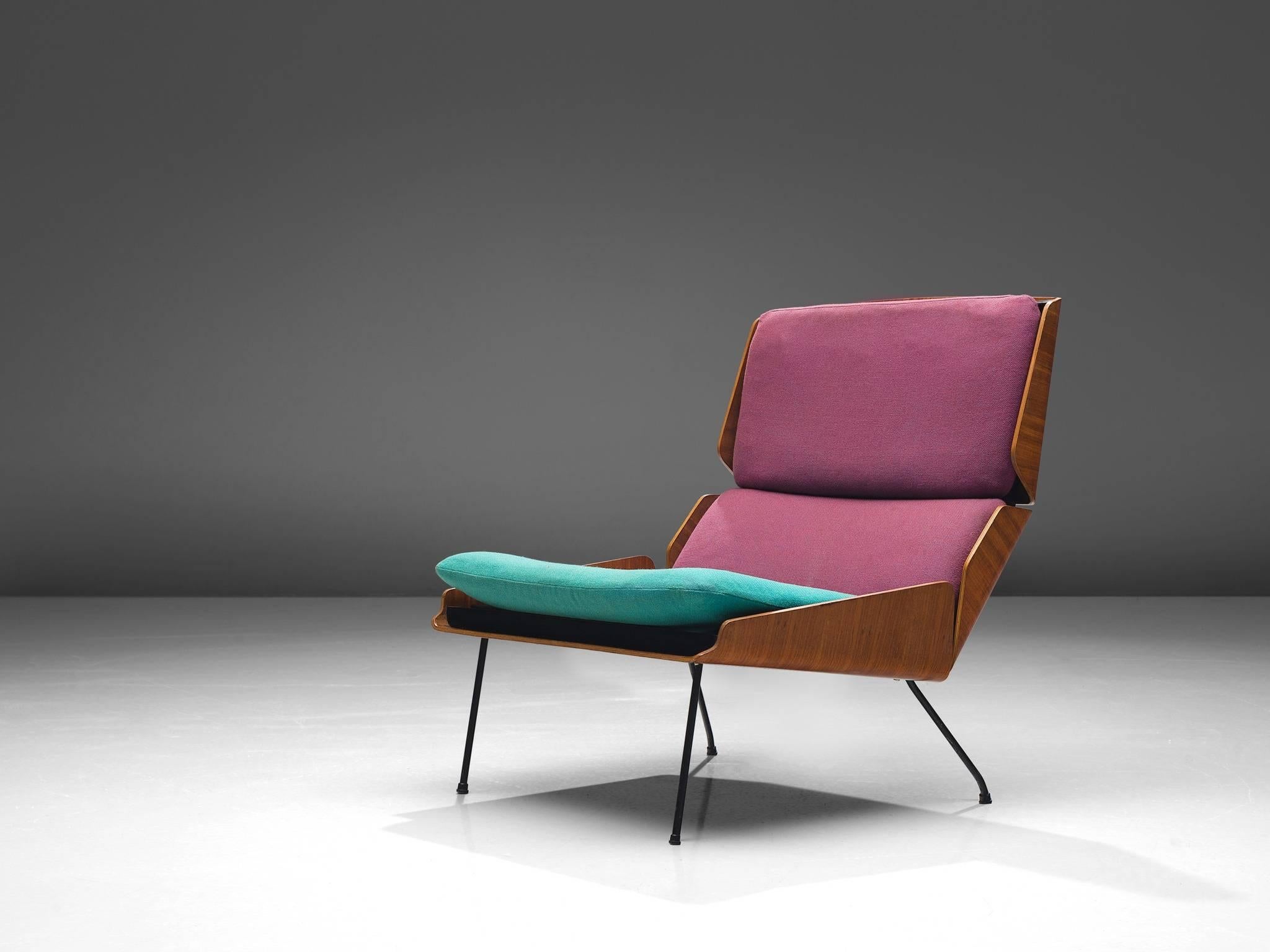 Georges van Rijck for Beaufort, lounge chair, plywood, pink and green upholstery, Belgium, 1959. 

This easy chair by Van Rijck is built up of three plywood pieces, one for the seat and two for the back. The upholstery has two different colors,