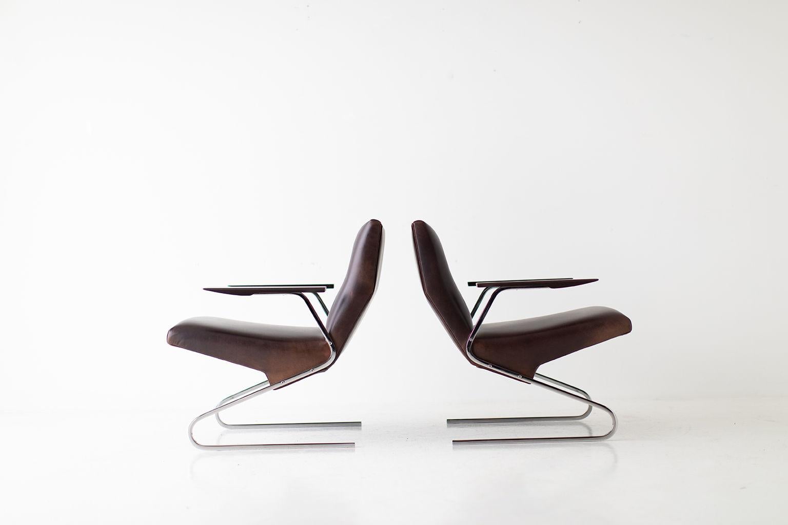 Designer: Georges Van Rijck.

Manufacturer: Beaufort.
Period/Model: Mid-Century Modern.
Specs: Chrome, leather, wood.

Condition:

These Georges Van Rijck leather lounge chairs for Beaufort are in excellent restored condition. The frames