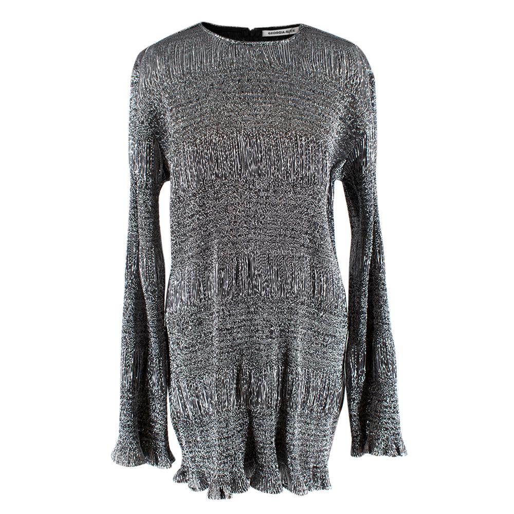 Georgia Alice Silver Metallic Lame Mini Dress

- Full sleeved mini dress
- Silver lame fabric 
- Ruched body
- Flared bell sleeves 
- Fluted hem 
- Figure hugging design 
- Concealed zip fastening along back

Materials: 
100% Polyester 

Hand Wash
