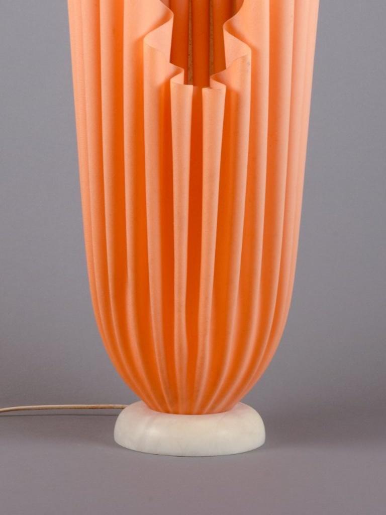 Georgia Jacobs, French designer.
Pink floor lamp in resin on a marble base.
Model 
