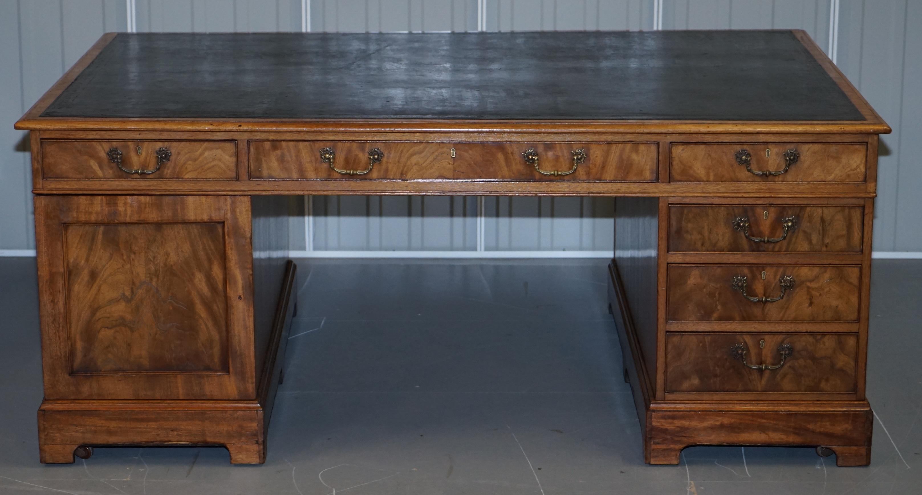 Wimbledon-Furniture

Wimbledon-Furniture is delighted to offer for sale this very rare original 12 drawer 2 cupboard Georgian Campaign mahogany luxury premium twin pedestal partner desk with dark leather writing surface and gold leaf embossed