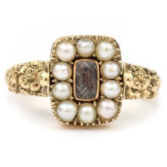 Georgian 14 Karat Gold, Black Enamel and Seed Pearl Swivel Mourning Ring, c.1817