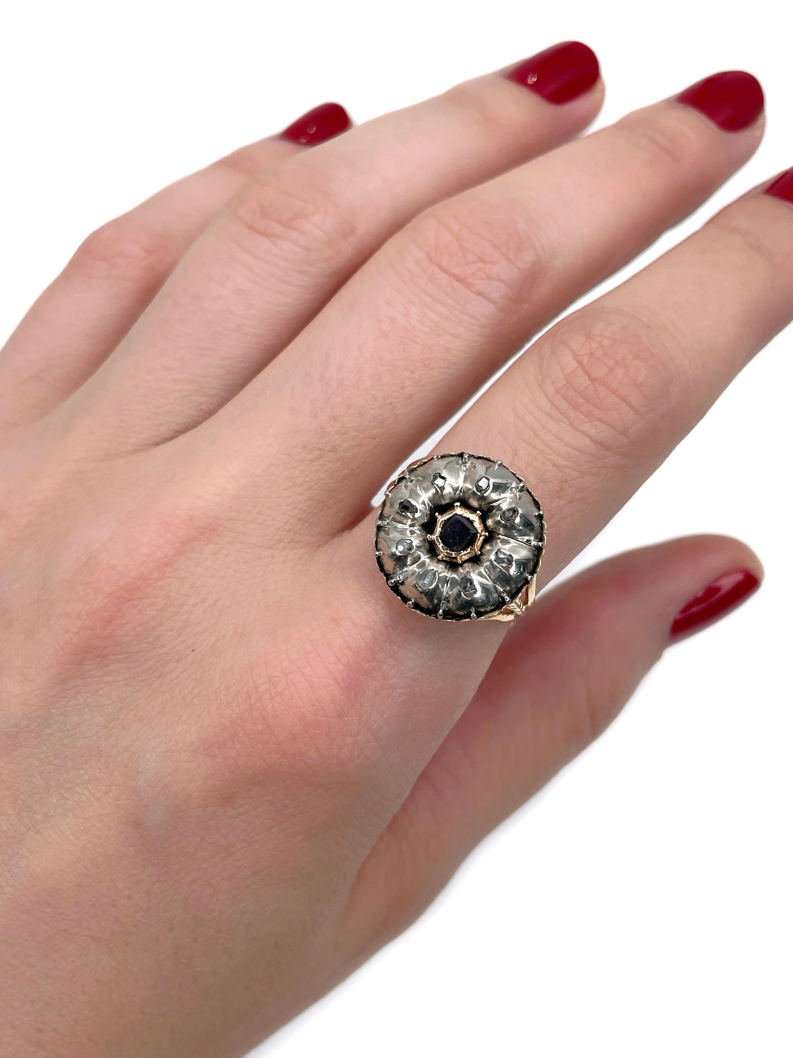 This is a Georgian cluster ring crafted in 14K gold and silver. It features ruby in the centre. The gem is surrounded with rose cut diamonds. 

Weight: 4.60g
Size: 18 (US 7.75)

IMPORTANT: Cannot be resized

———

If you have any questions, please