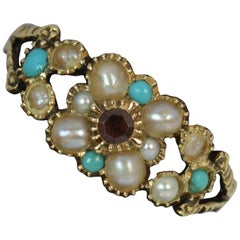 Antique Georgian 15 Carat Gold Garnet Turquoise and Seed Pearl Daisy Cluster Ring