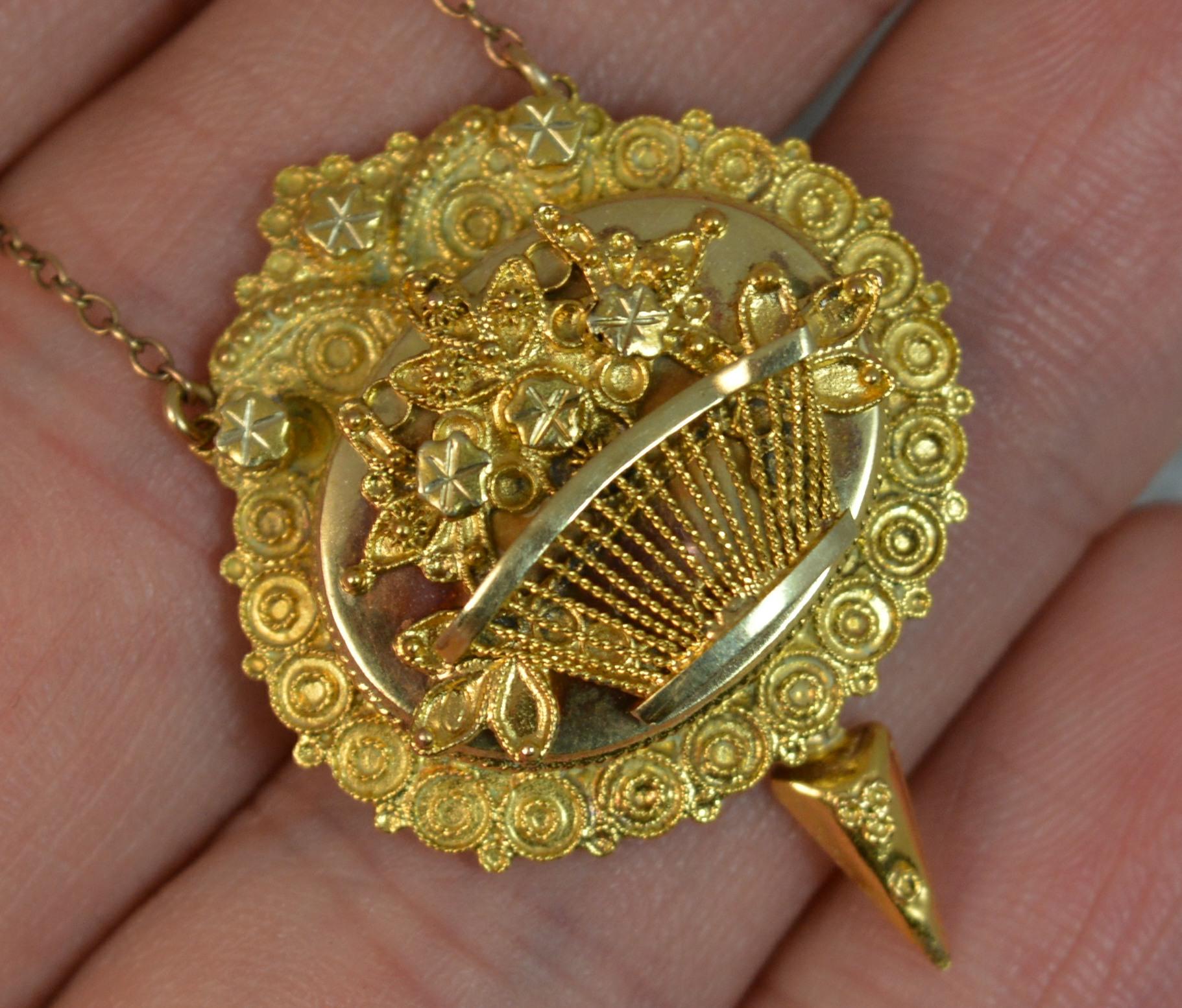 A fantastic Georgian era pendant and chain.
15 carat yellow gold drop pendant. Designed as a hand formed giardinetti with little gold drop to base. 
Complete with simple gold chain.
CONDITION ; Excellent. Crisp design and pattern. Working clasp.