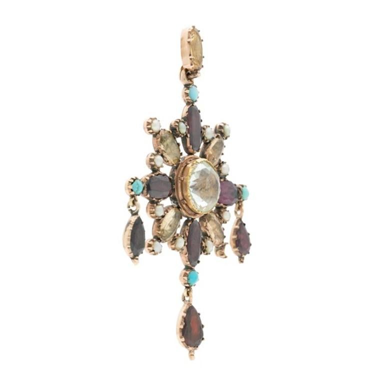 Georgian 15k Yellow Gold, Aquamarine, Garnet, Natural Pearl, Imperial Topaz, and Persian Turquoise C.1820s

Additional Information:
Period: Georgian
Year: c.1820s
Material: 15k Yellow Gold, Aquamarine, Imperial Topaz, Natural Pearl and