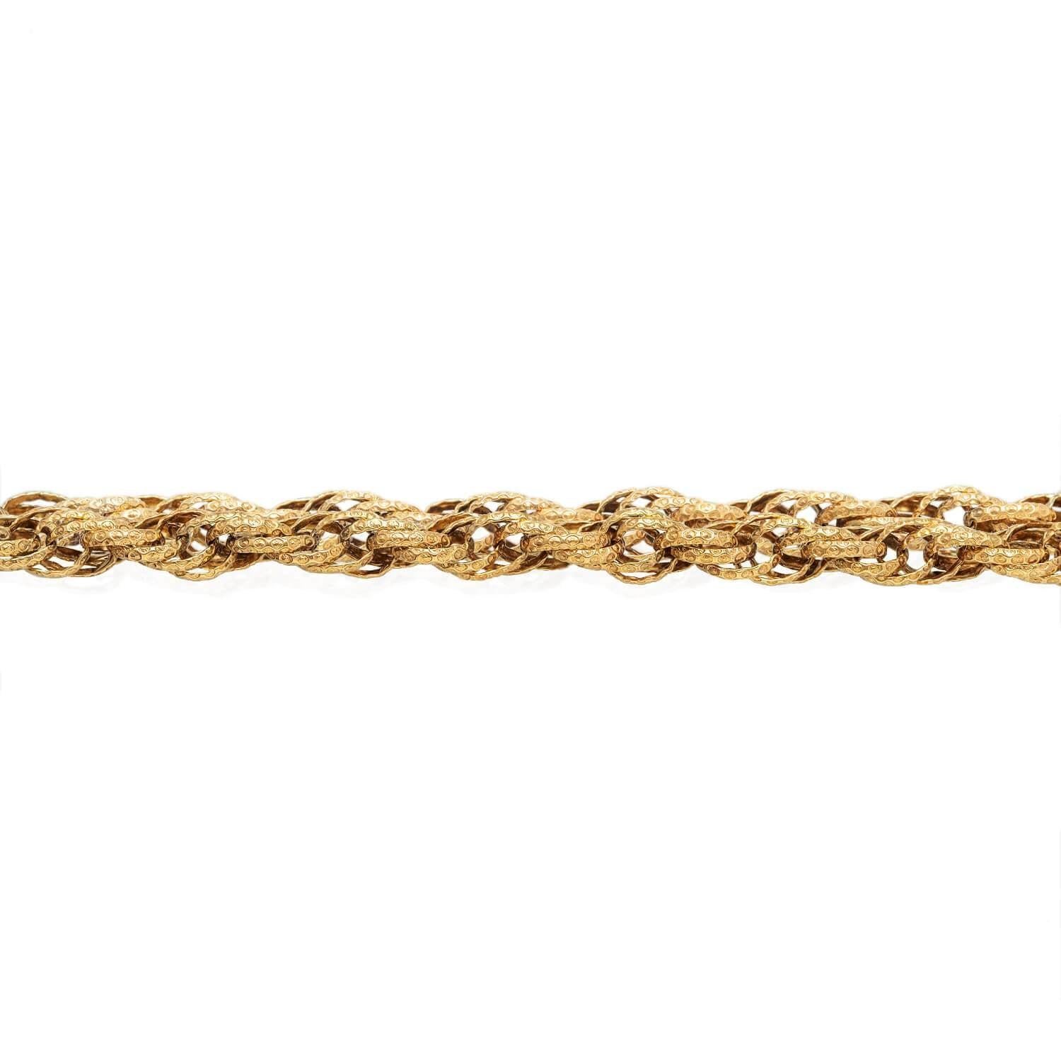 A gorgeous chain necklace from the Georgian (ca1750s) era! Crafted in 15kt yellow gold, this chain is comprised of interlocking oval links that are woven together to create a twisted rope design. The chain fastens at an ornate clasp, inset with four