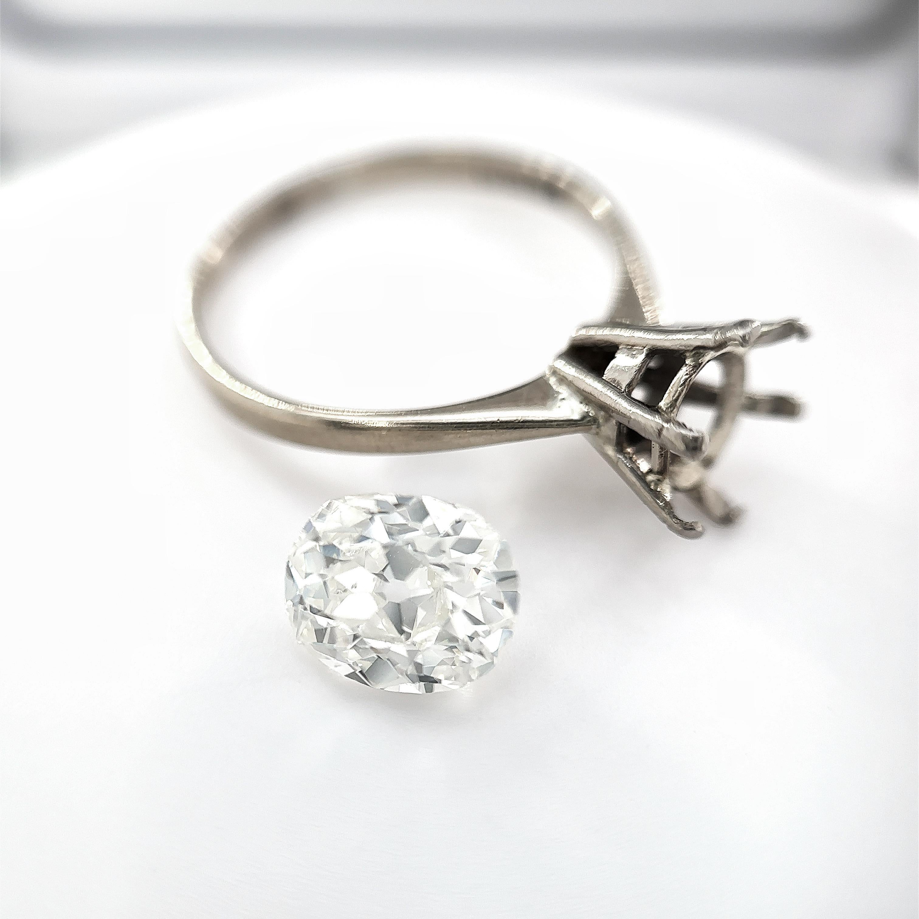This exquisite 1.69 carat old mine cut diamond ring is truly a timeless treasure. Crafted with utmost precision and attention to detail, this ring showcases the exceptional beauty and brilliance of a rare old mine cut diamond.
 
The centre piece of