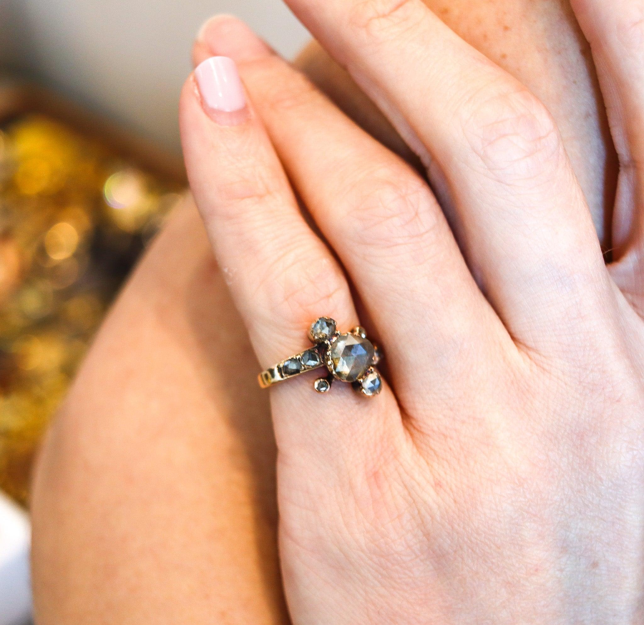 Antique 18th century Georgian ring with diamonds

This is a fabulous antique ring created in England during the Georgian period back in the middle of the 18th century, circa 1760. The rare ring was carefully crafted with beautiful scrolls motifs in