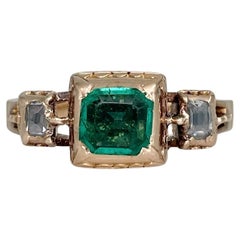 Georgian 18 Karat Gold 1.50 Carat Emerald 0.18 Carat Diamond Three-Stone Ring