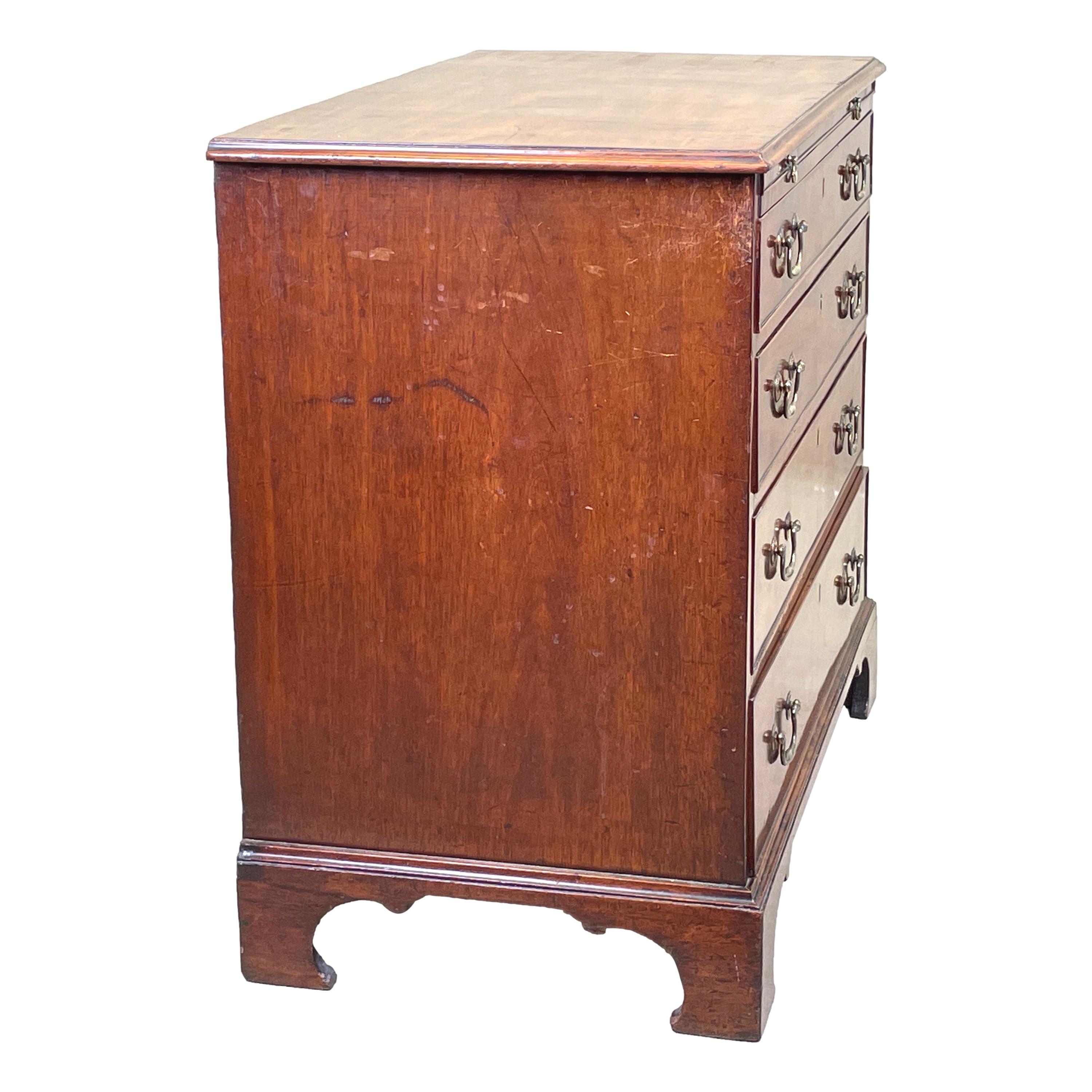 A very good quality mid 18th century chippendale period Georgian Mahogany chest, having well figured top over slide and four long drawers, retaining original brass swan neck handles, raised on elegant original shaped bracket feet.

Whilst a