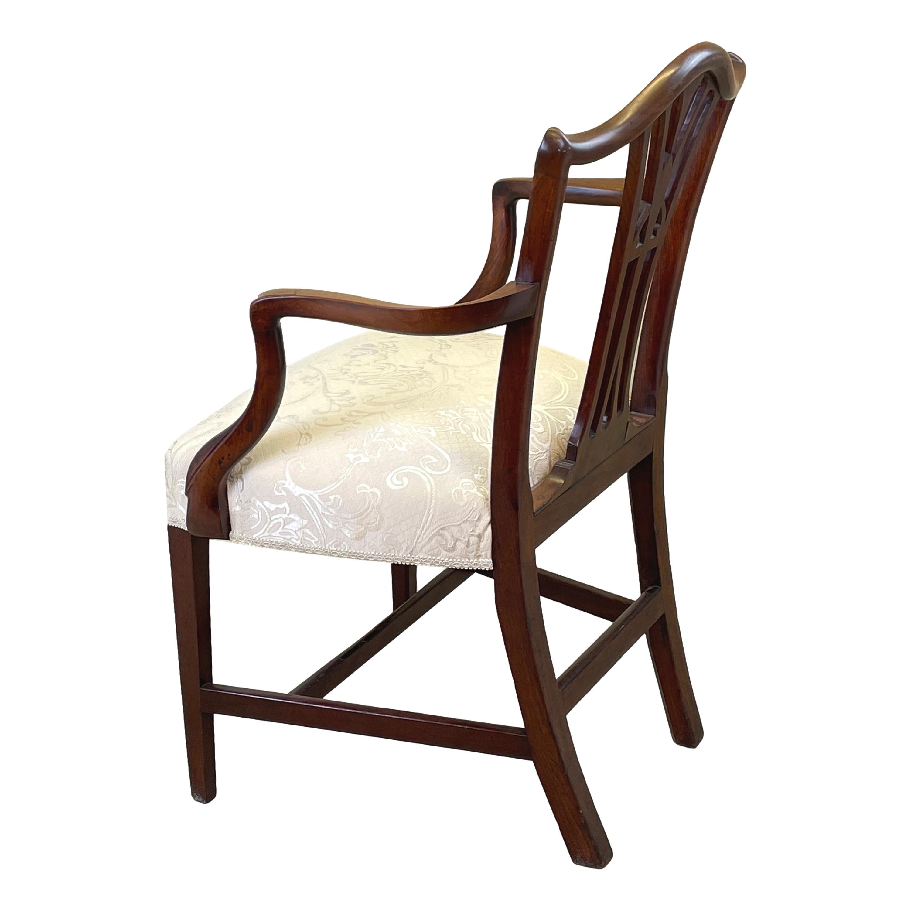 A superb quality and rarely found 18th century Hepplewhite
Period mahogany masters armchair of imposing proportions
Having carved decoration to pierced splat back over
Upholstered seat raised on elegant square tapered
Legs and