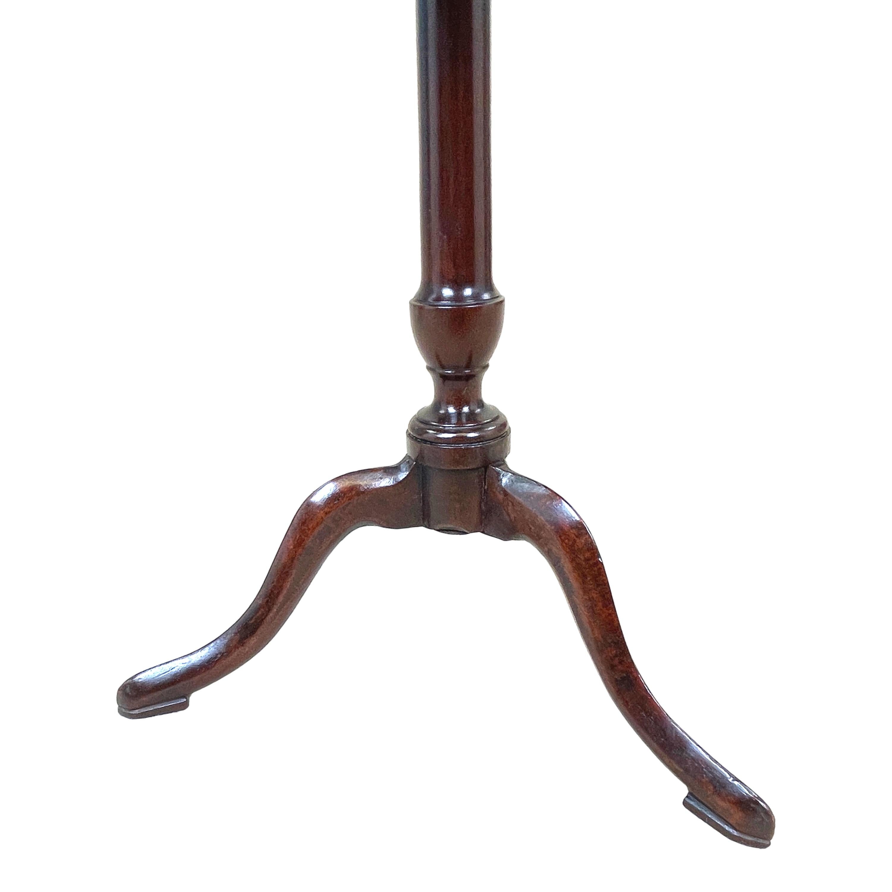 A superb quality 18th century mahogany George II
Period miniature table having well figured circular
Tilting top over vase turned central stem with
Elegant bold tripod legs terminating on
Pointed pad feet



(Almost certainly made as a