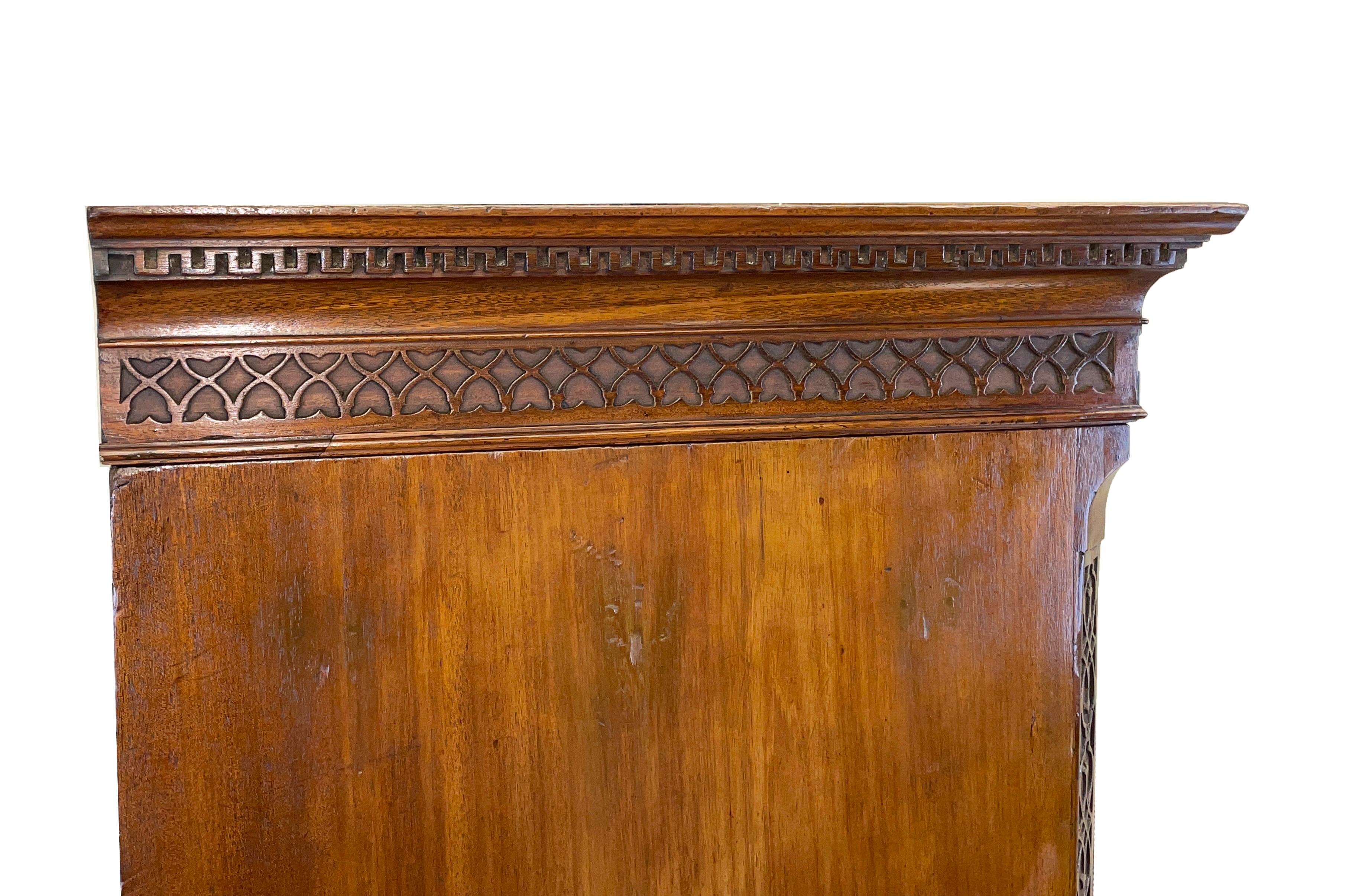 A very good quality and charming mid-18th
century mahogany chest on chest, or tallboy,
having Greek key cornice over three short
and six long drawers retaining original brass
swan neck handles flanked by canted corners
attractive blind fretwork