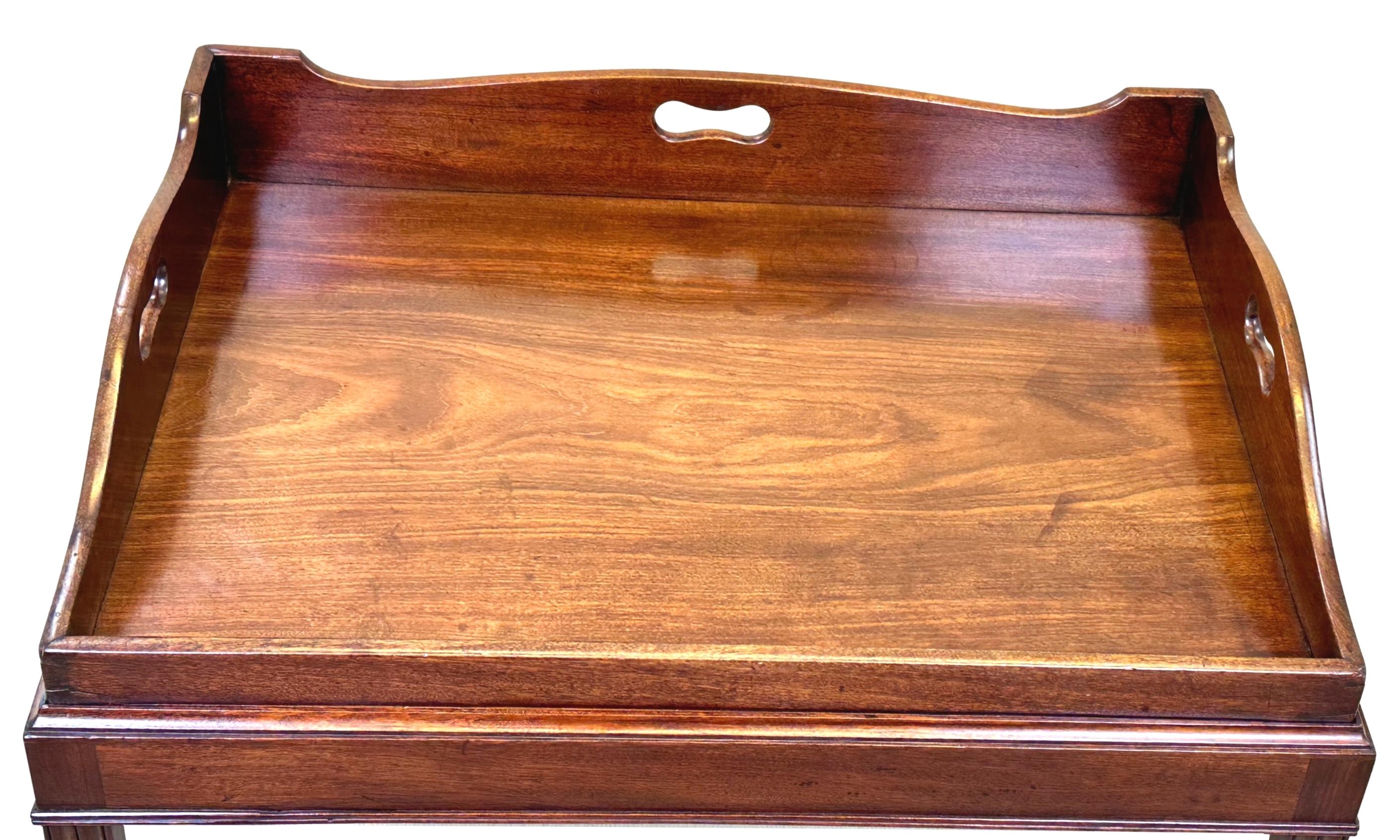 A Very Good Quality George III Period, Late 18th century Mahogany Butlers Tray, Of Superb Rich Colour And Patina Throughout, Having Elegant Shaped Sides With Pierced Carrying Handles, Housed On Well Made Later stand With Square Chamfered Legs And