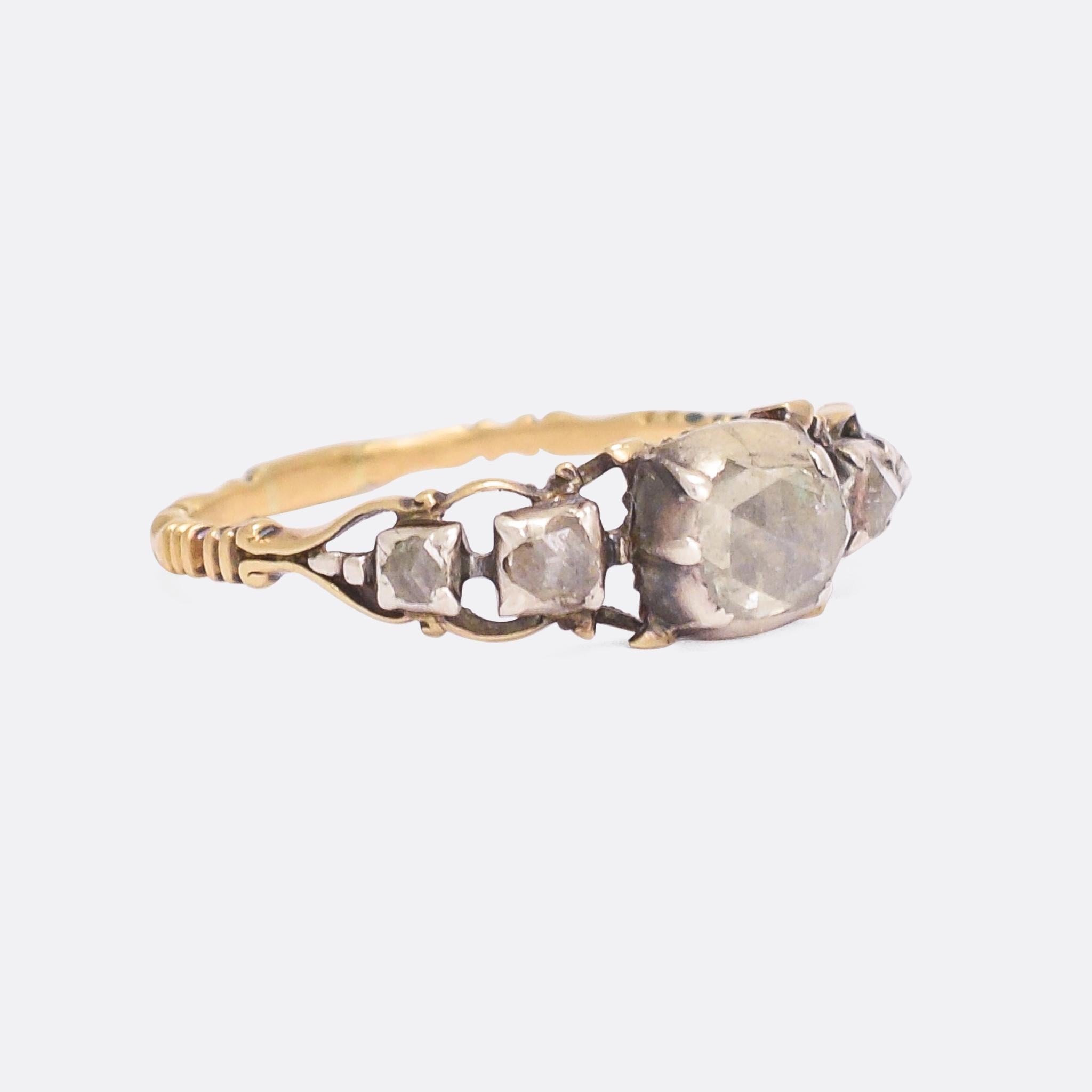 A stunning Georgian diamond ring dating from the late 18th Century, circa 1780. The highly domed rose cut stones rest in cut-down 