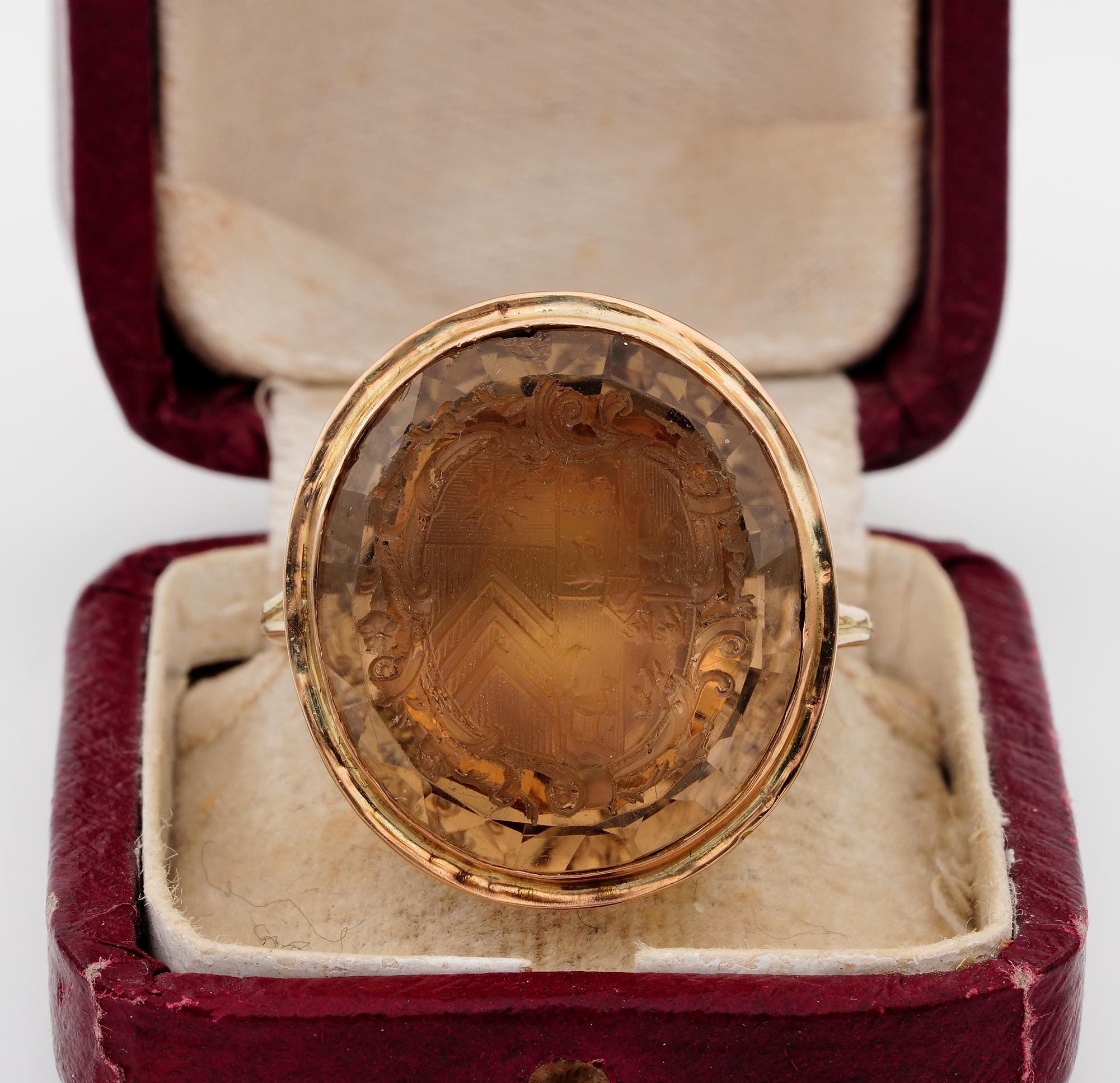 Georgian Signature
Large antique Georgian period Citrine intaglio seal ring, 1790/1800 ca
hand crafted of solid 18 KT gold
Close back set with a large natural Citrine of approx 24.00 Ct – 21.15 x 18.91 mm. – intricately hand carved Coat of Arms