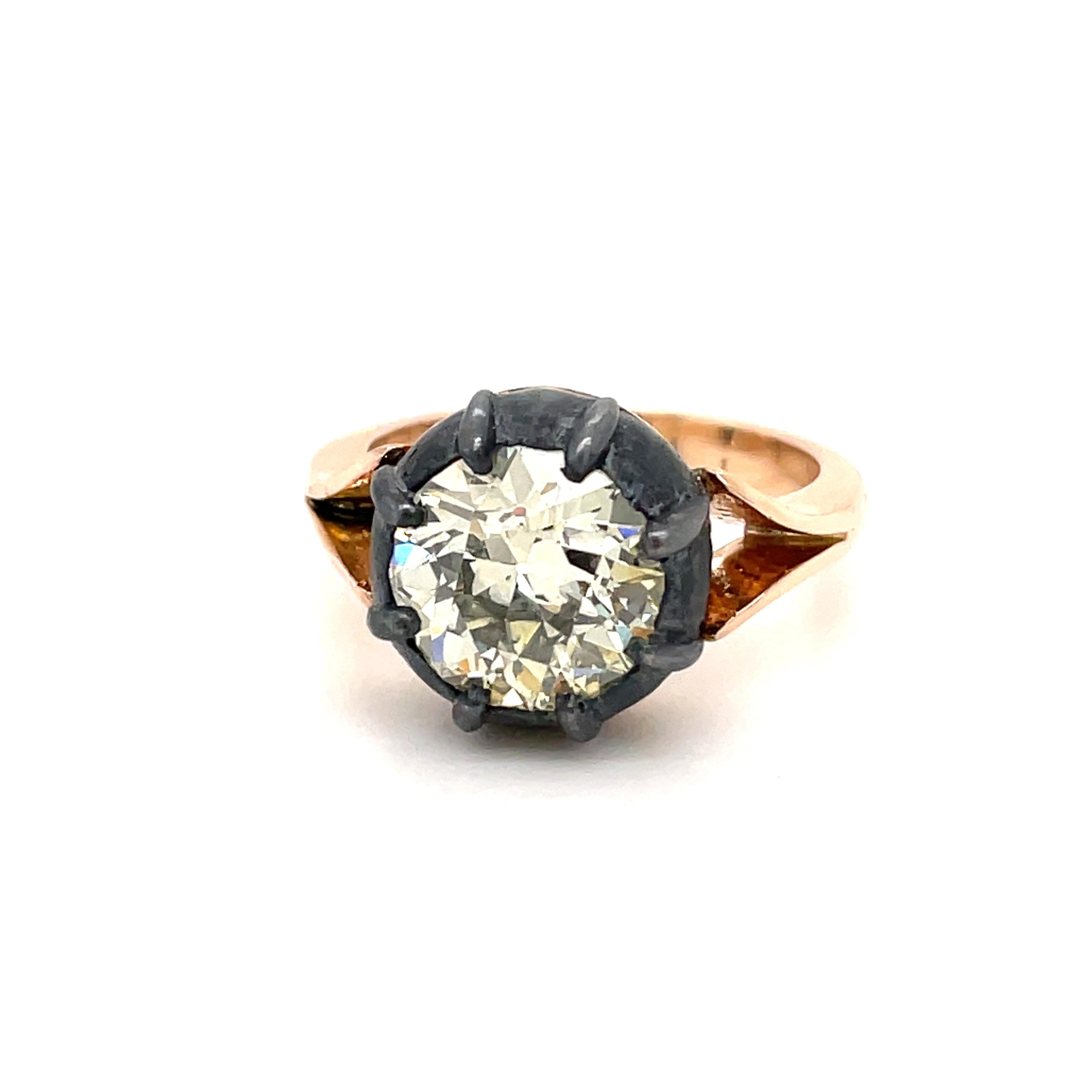 Set with a 3.40 ct. old mine cut diamond in a Georgian style cut-down setting and signature Button Back setting, it has a timeless yet modern aesthetic. Designed to be layered and mixed for an effortless look, the ring is handcrafted in 18k white