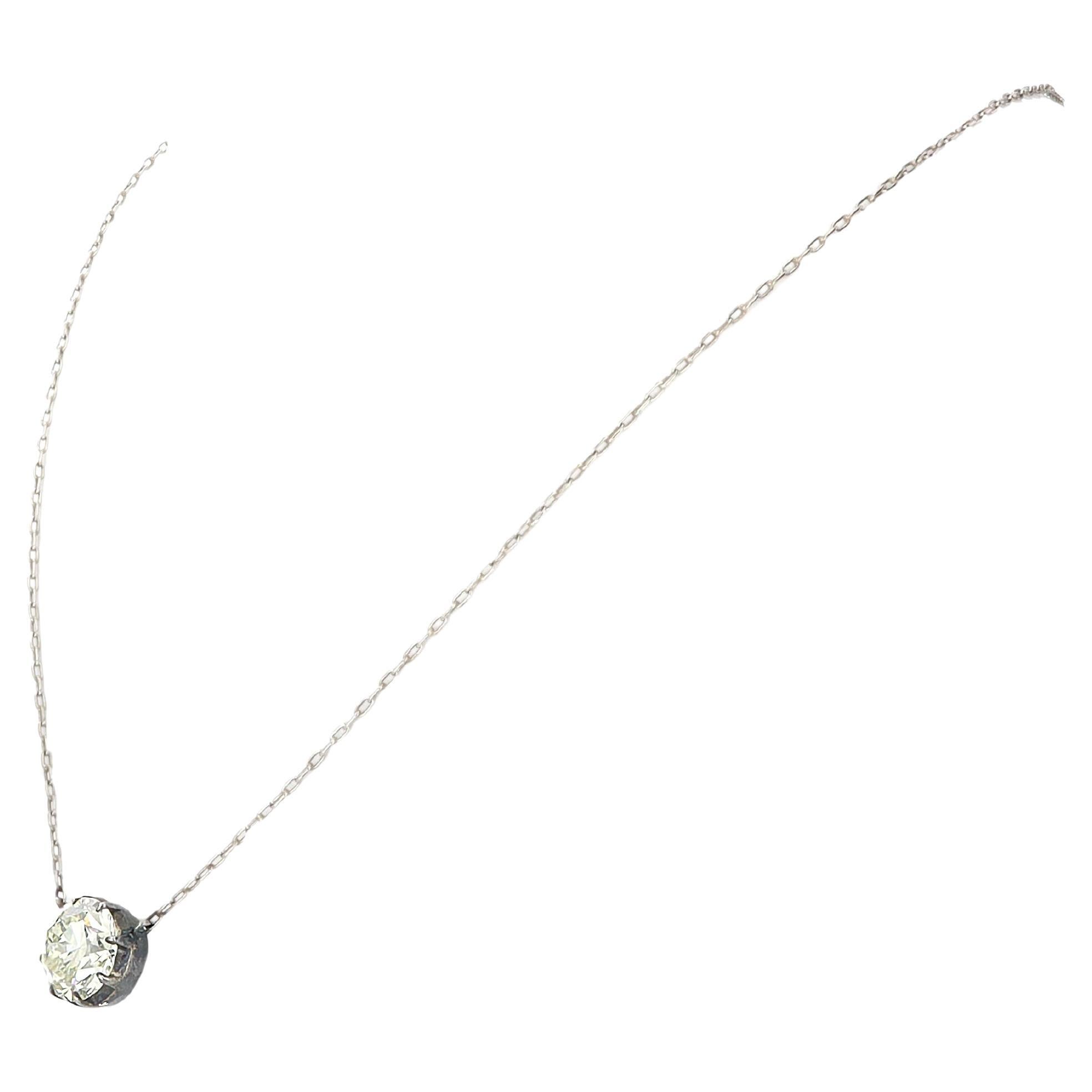 Ladies Georgian old European diamond pendant weighing 3.40 tcw set in sterling silver setting accompanied by an 18 inch platinum chain.
