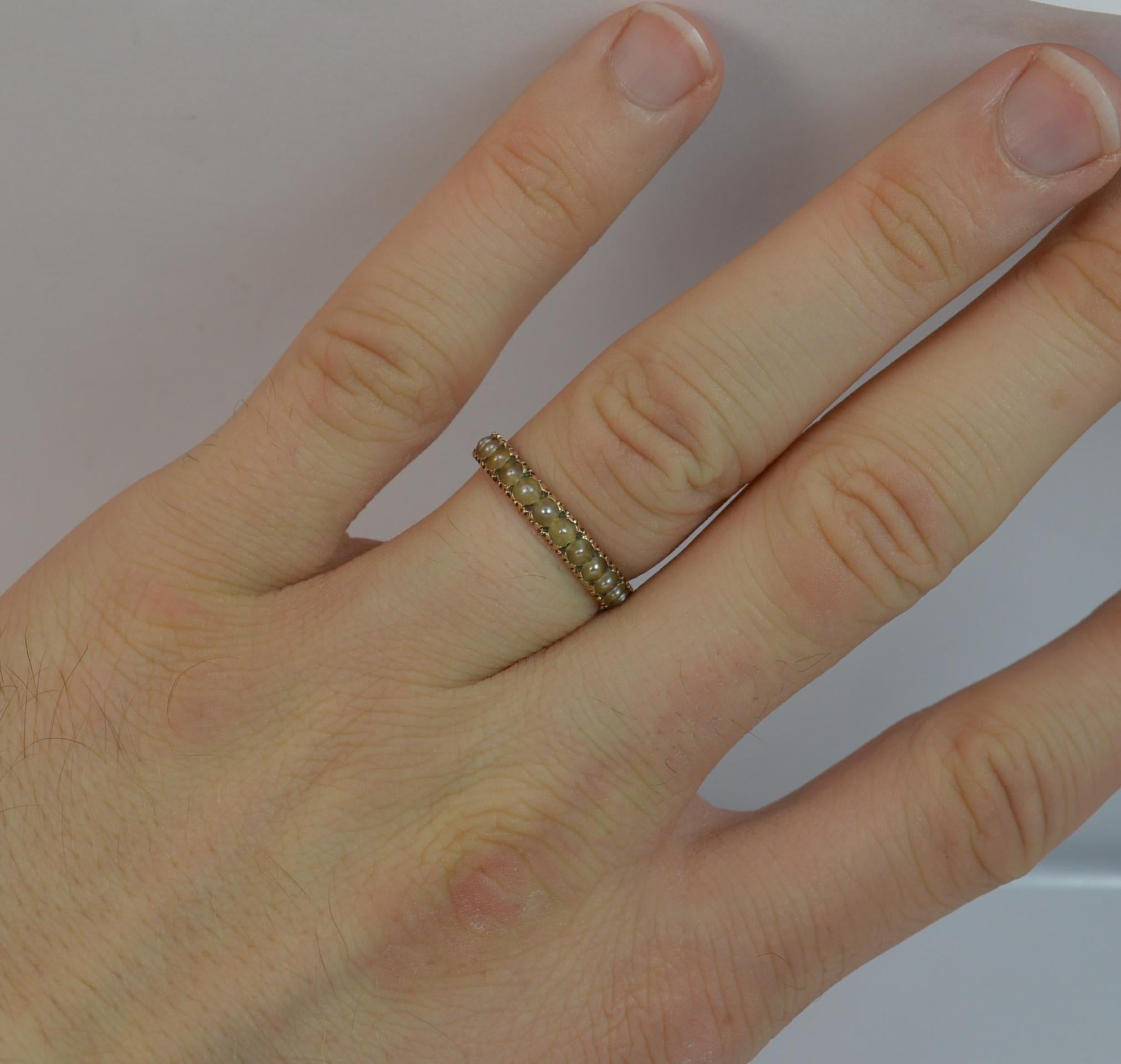 
A rare true Georgian period full eternity stack ring.

Solid 9 carat rose gold example.

​Designed with many seed pearls throughout.

3.2mm band.


CONDITION ; Very good. Well set pearls. They all look to be original and have an equal level of wear