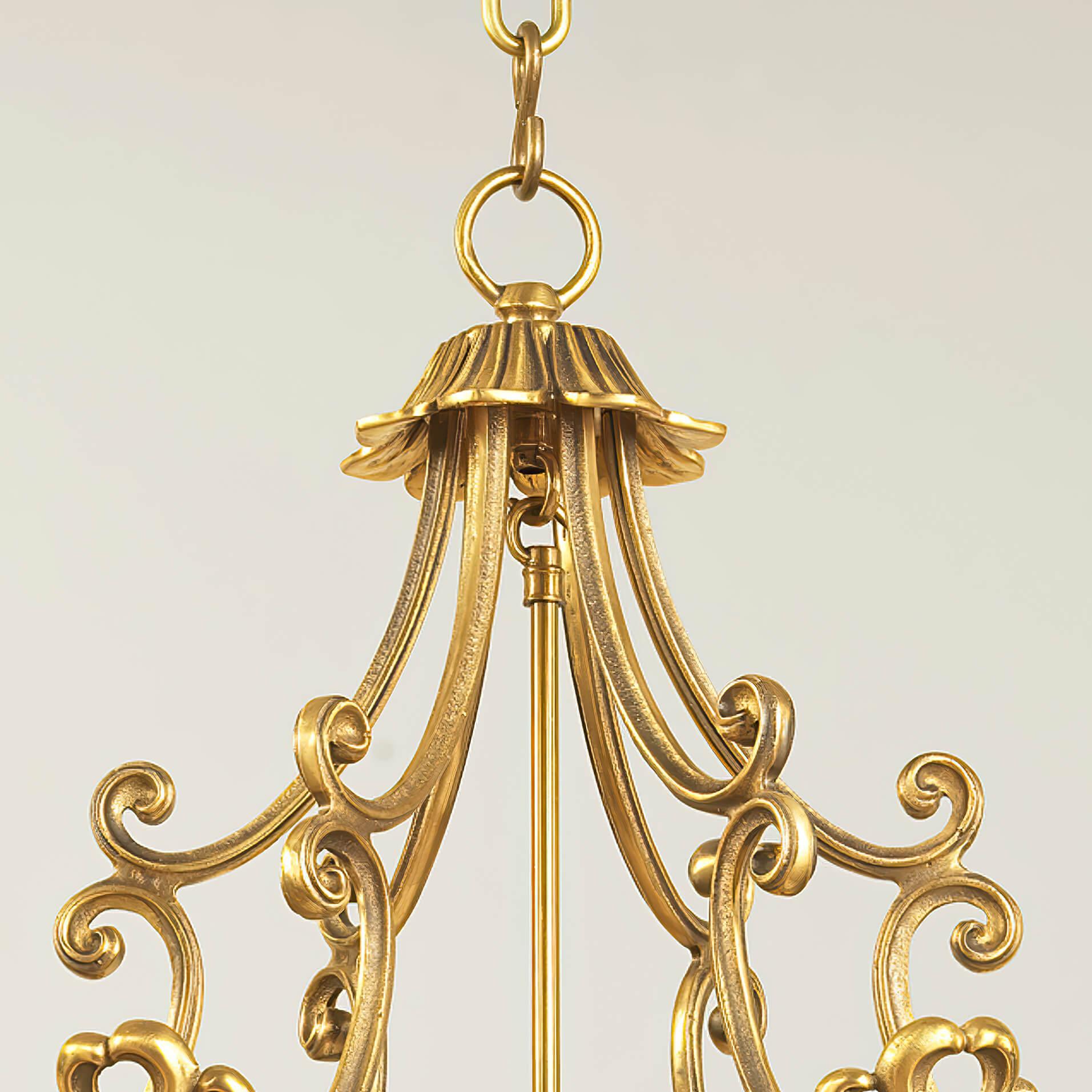 The ornate Georgian brass hexagonal hall lantern with pagoda form scroll metal crown, with Anthemion forged mounts, six glass panels with door, a Fleur-de-lis mounted column frame with five-lights and melon ball base finials.

Dimensions: 21.5