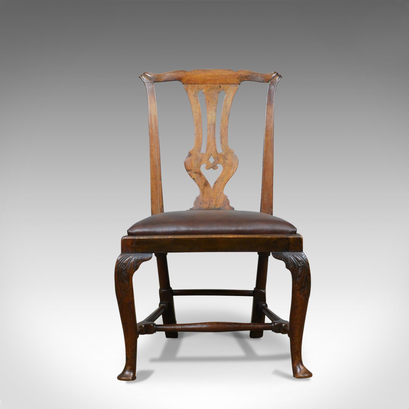 This is a Georgian antique chair. An English, mahogany, mid-18th century side chair dating.

Of Classic Georgian form
In select mahogany with a deep lustre and desirable aged patina
Classic transitional piece into Chippendale