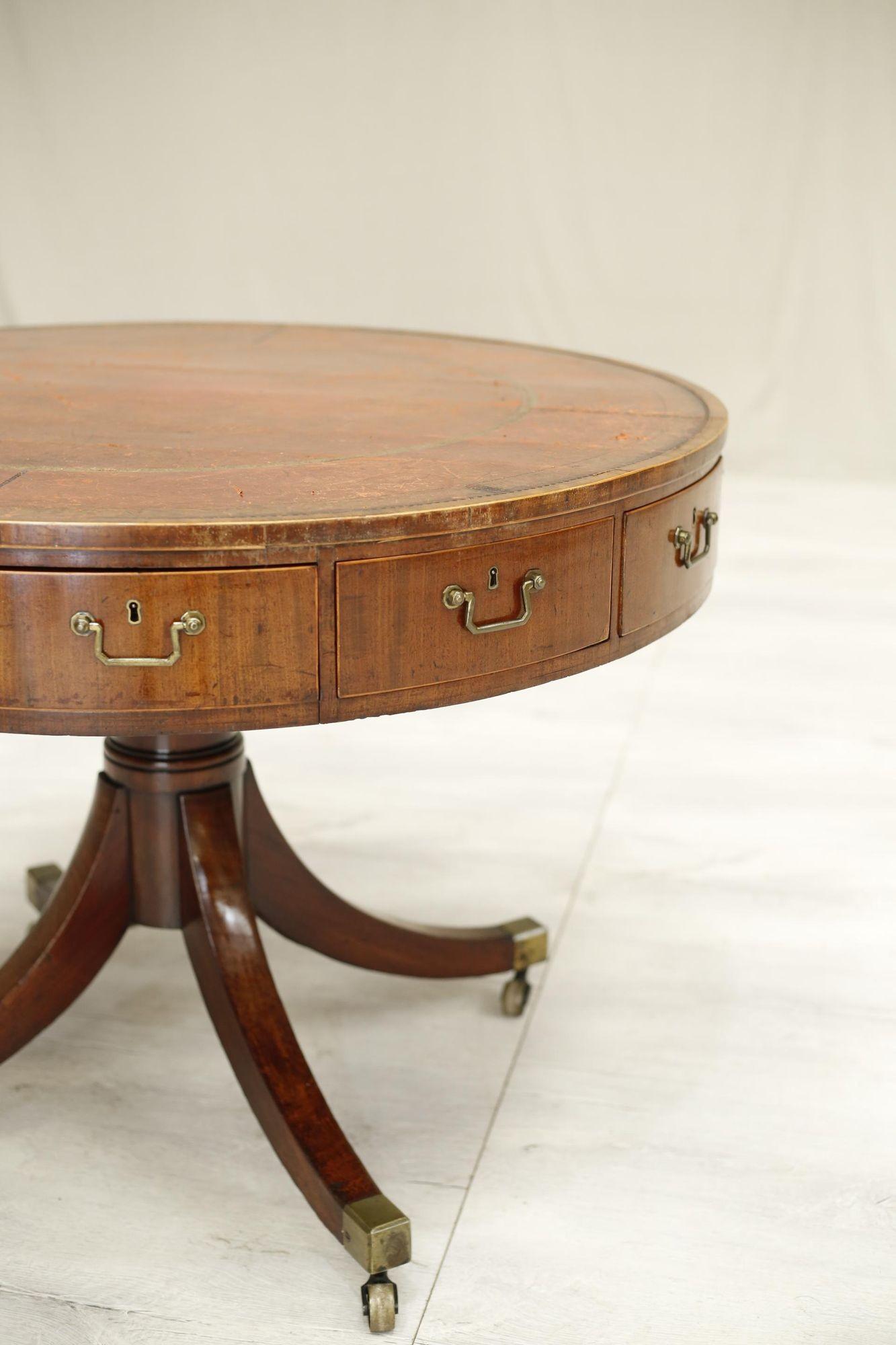This is a superb quality Georgian drum table c.1780. It is a Sheraton manner with multiple drawers around its entirety, all useable and the top rotates smoothly which is why I believe this is a form of rent table. The patina to the mahogany is