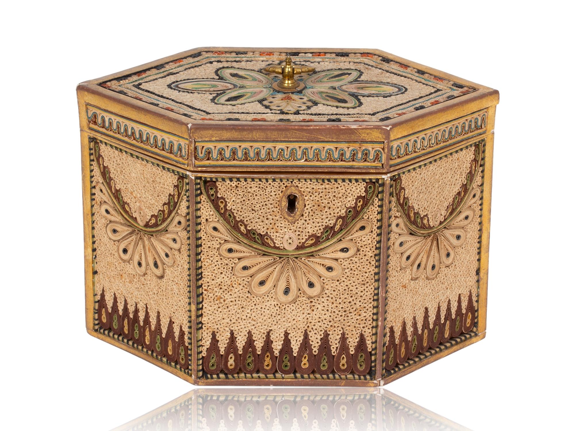 Free Worldwide Shipping

George III Circa 1780

From our Tea Caddy collection, we are delighted to offer this Antique Paper Scroll Tea Caddy. The Tea Caddy of elongated hexagonal form framed in a beautiful gilt wood with thirteen individual panels