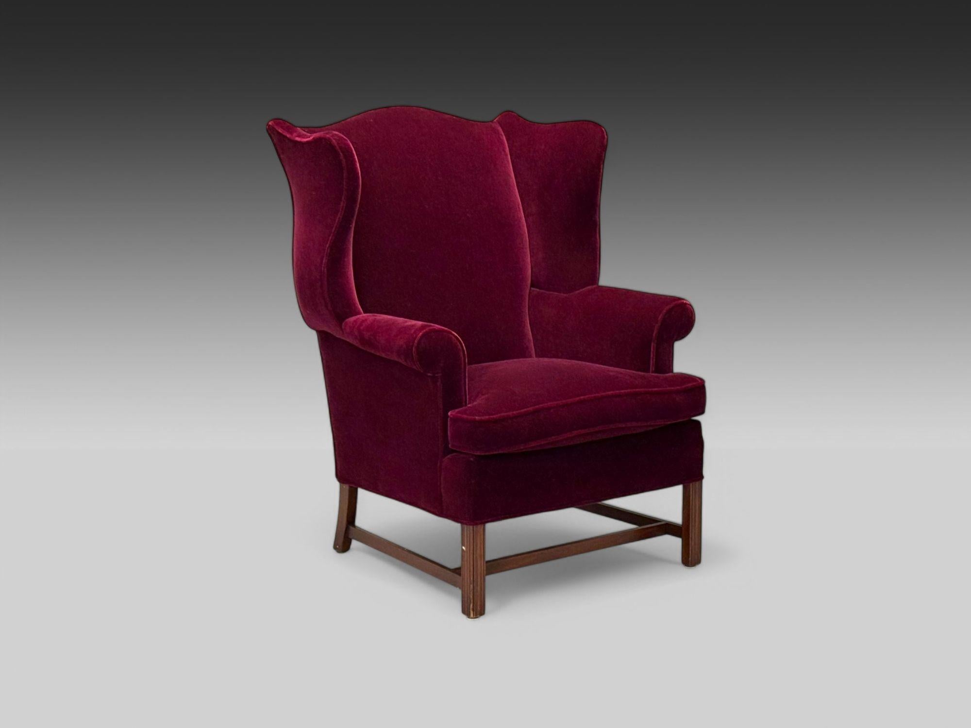Georgian, Aubergine Mohair, Stained Wood, Wingback Armchair, England, 1970s

A Georgian style wingback armchair designed and produced in England, 20th century. This example is upholstered in a good quality deep purple/burgundy mohair
