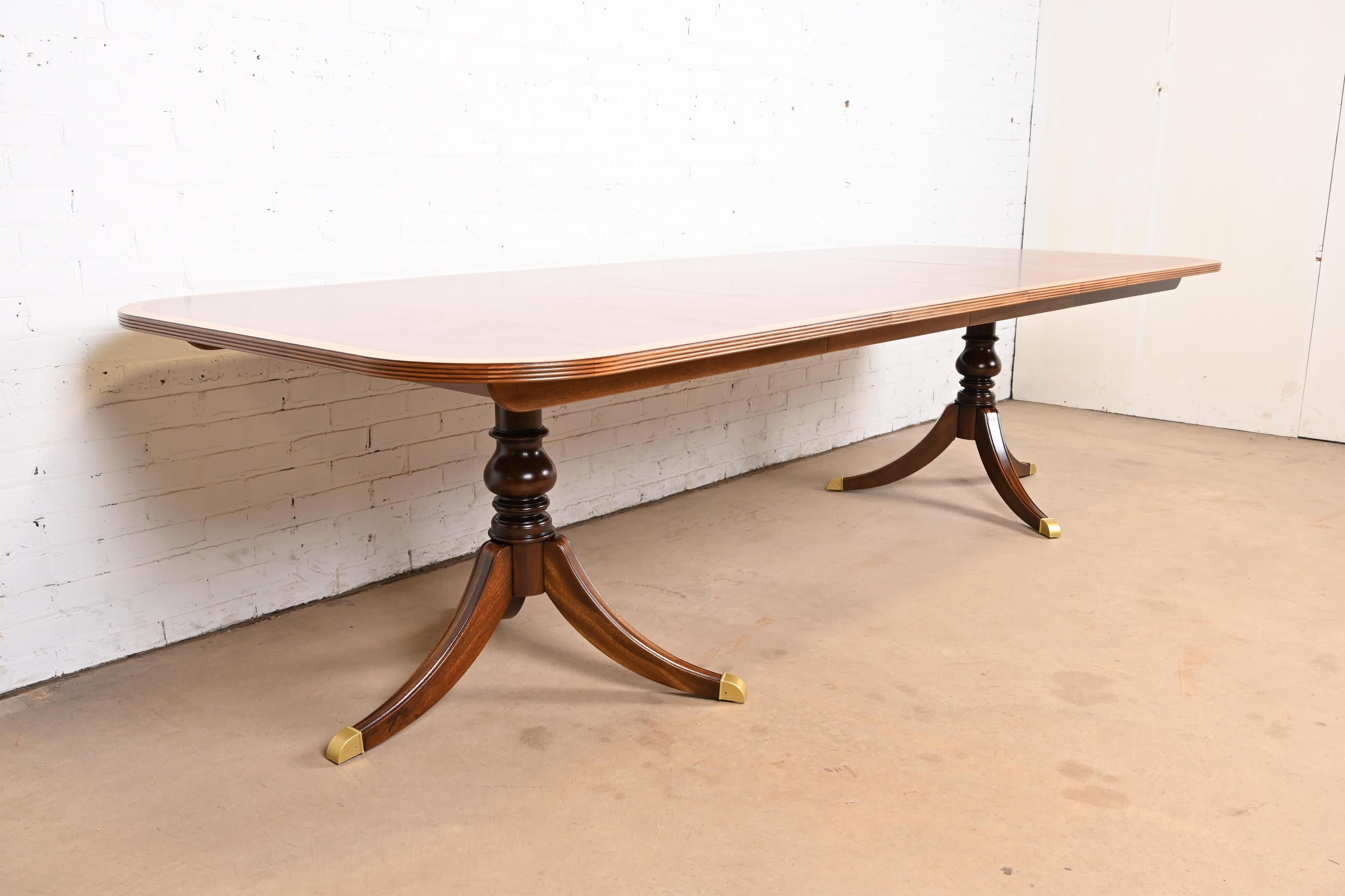 American Georgian Banded Flame Mahogany Double Pedestal Dining Table, Newly Refinished