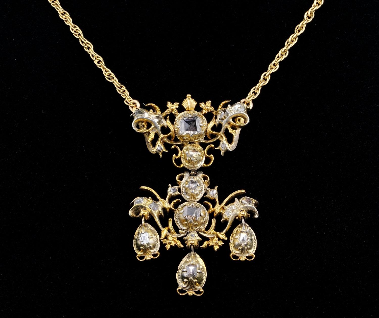 This beautiful Baroque Georgian period pendant is silver pure gold gilt, 1700 ca
Combined with an antique Victorian period (latter in time than the pendant) 9 KT solid gold chain which matches nicely to the pendant
Pendant is  designed in a top Bow