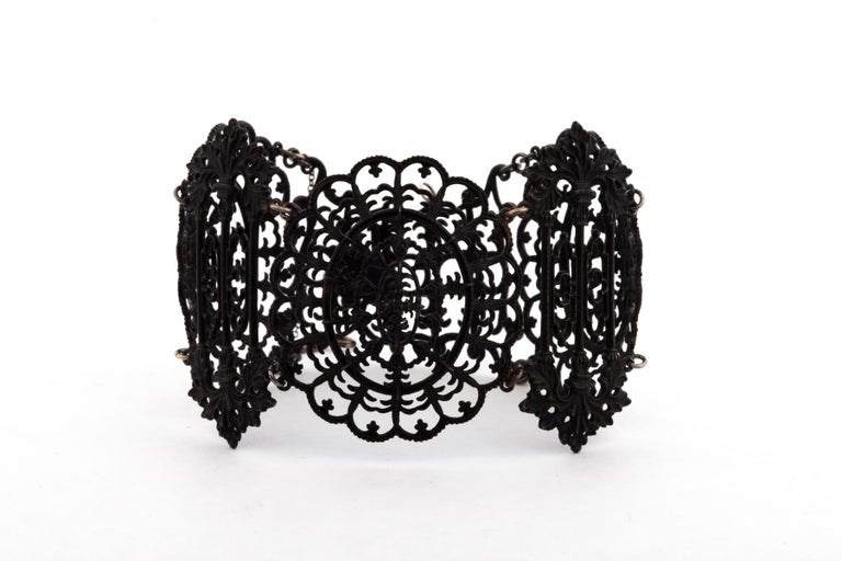 Berlin Iron has been a passion of collectors for hundreds of years and of this dealer, but not that long,  and this Gothic bracelet is no exception. The graceful curves, the spires, the spikes, the appearance of lace in iron, the complexity, the