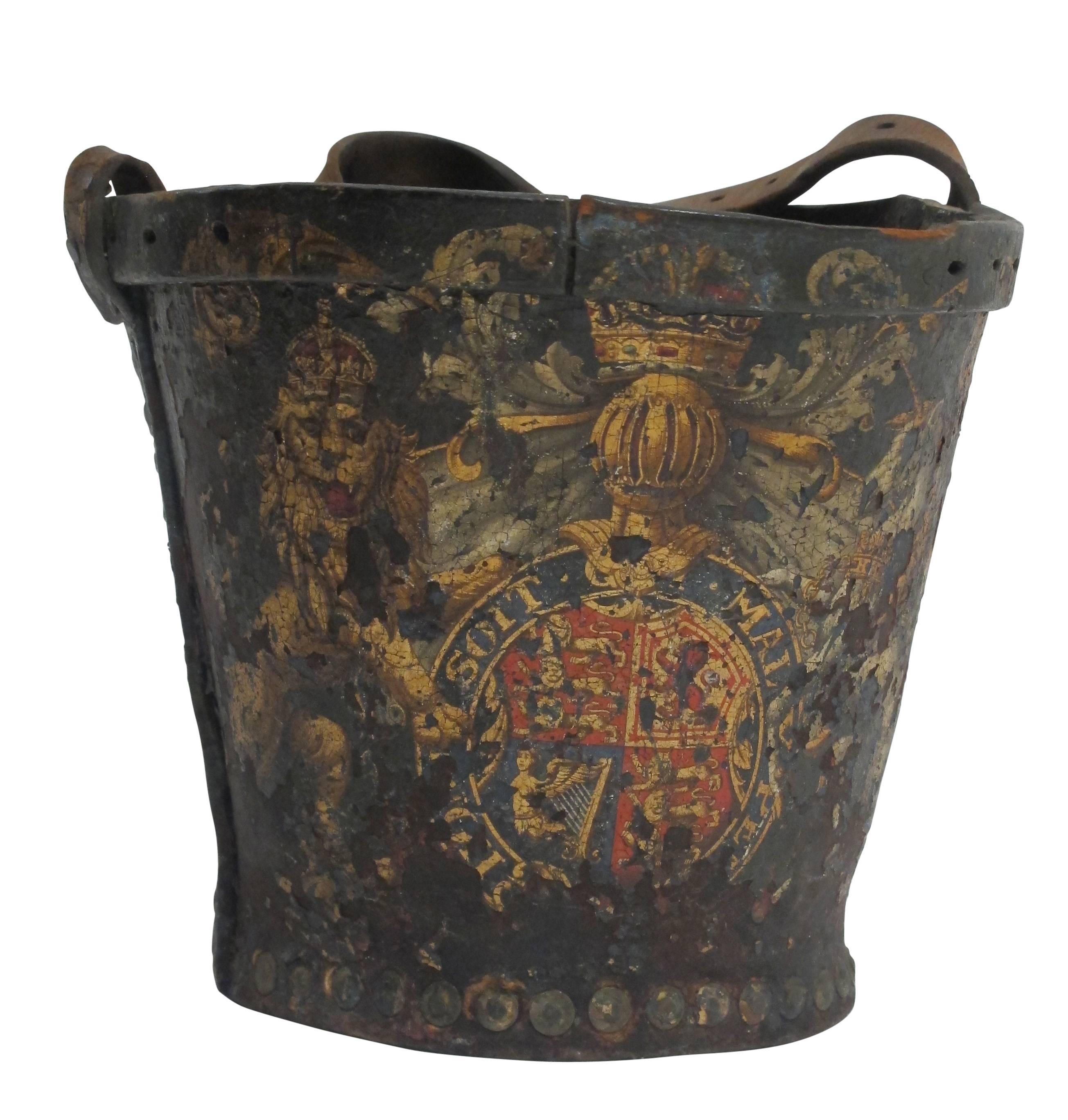 Antique black leather fire bucket with hand-painted elaborate British insignia, England, early 19th century.