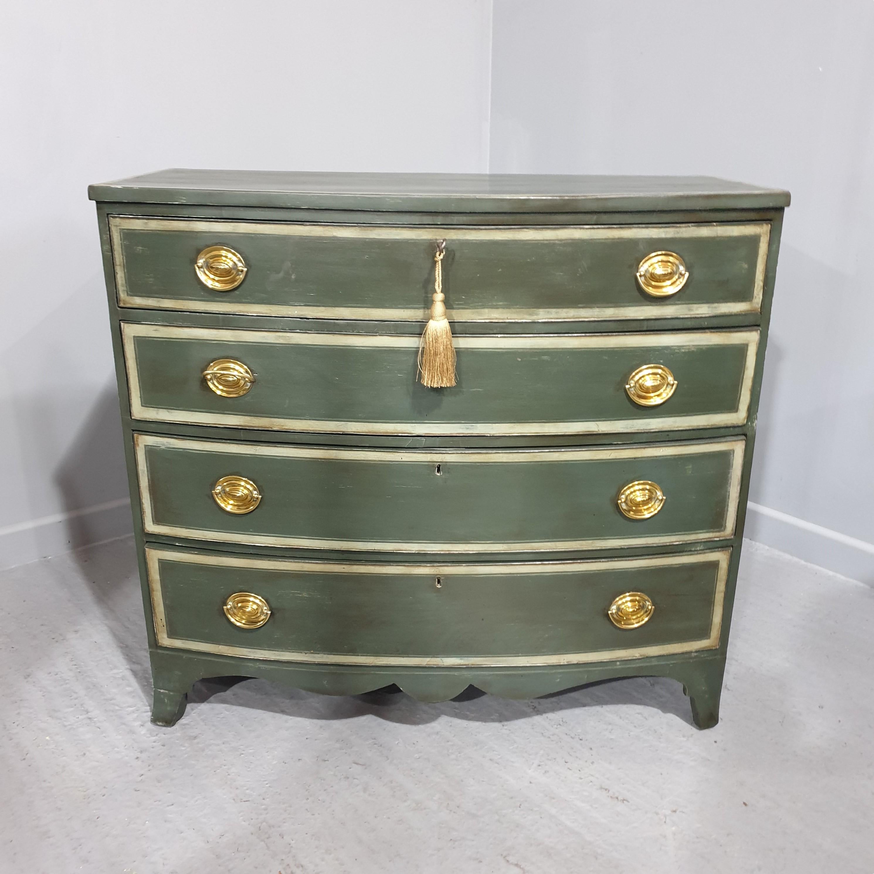 Very good green painted Georgian bow fronted four drawer chest, oval plate handles, crossbanded and tram lined, standing on bracket feet, in overall very good condition.