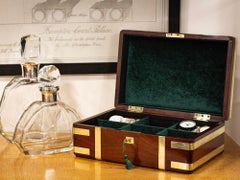 Caja de reloj joyero georgiana de caoba encuadernada en latón