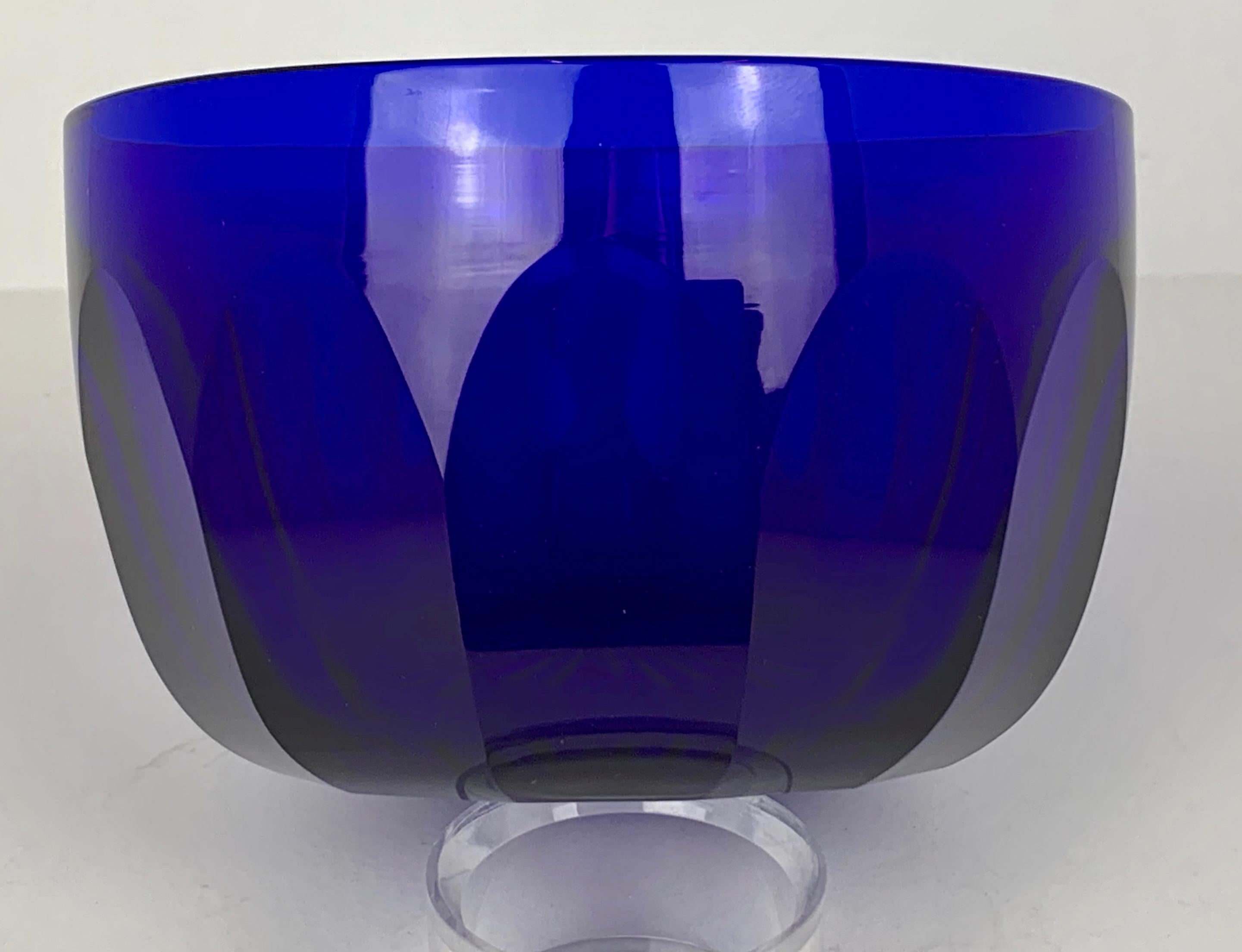 Magnificent heavy, hand blown, and slice cut Georgian Bristol blue finger bowl. The sides have perfect slice cut planes and deep star cutting on the base. This cobalt blue bowl has such deep color it is close to looking purple in the light.  A