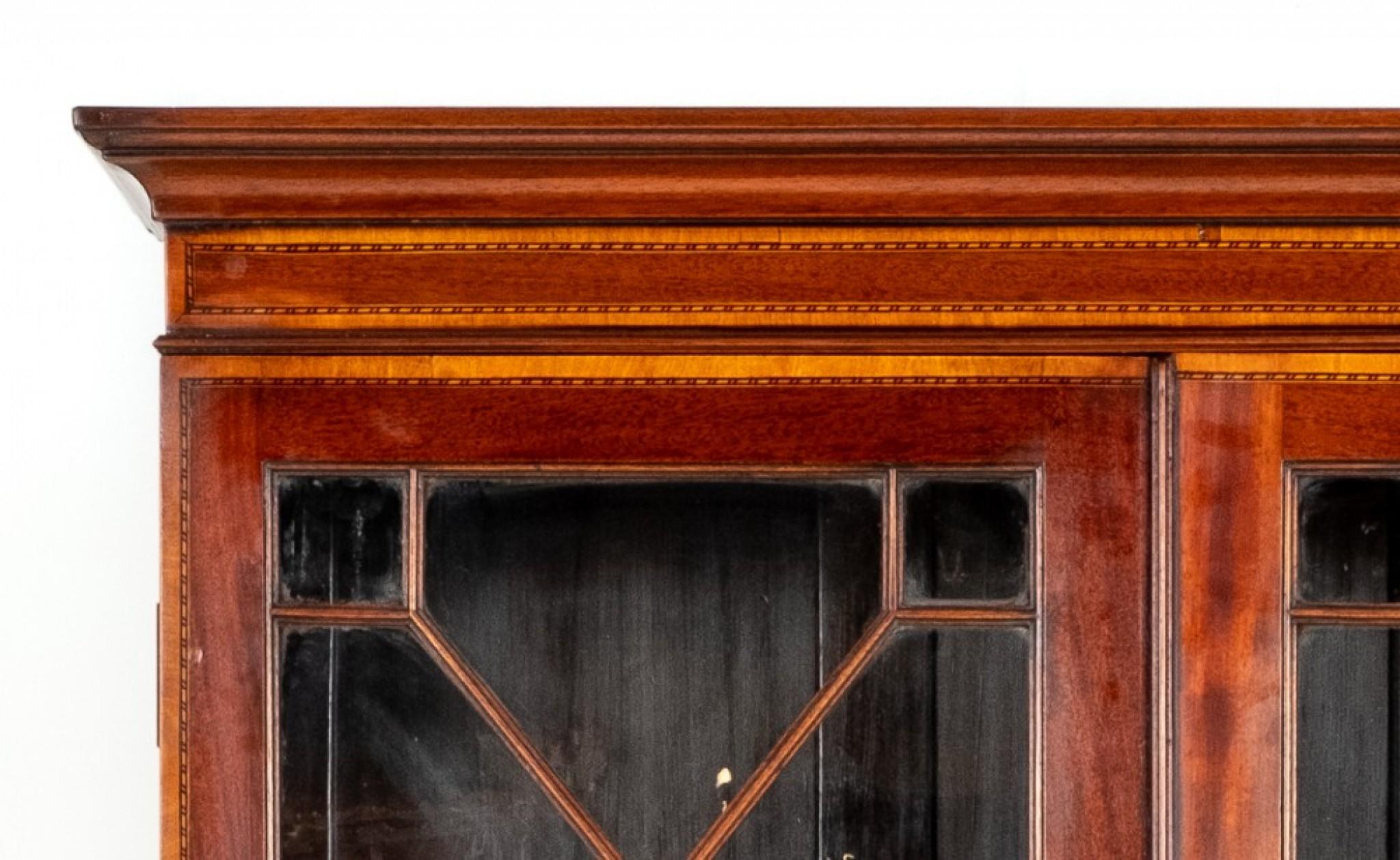 Georgian Mahogany Bureau Bookcase.
The Base Having an Arrangement of 2 Over 3 Oak Lined Drawers With Brass Swan Neck handles.
Circa 1800
The Fall Opens to Reveal a Leather Writing Surface (replacement) with hand Applied Gilt and Blind Tooling and