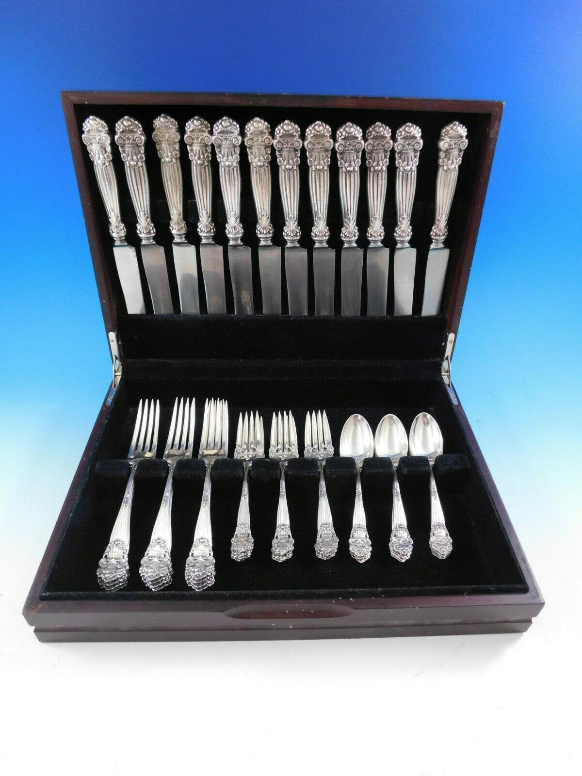 Dinner size Georgian by Towle sterling silver flatware set, 48 pieces. This set includes:

12 dinner size knives, with stainless blades, 9 7/8