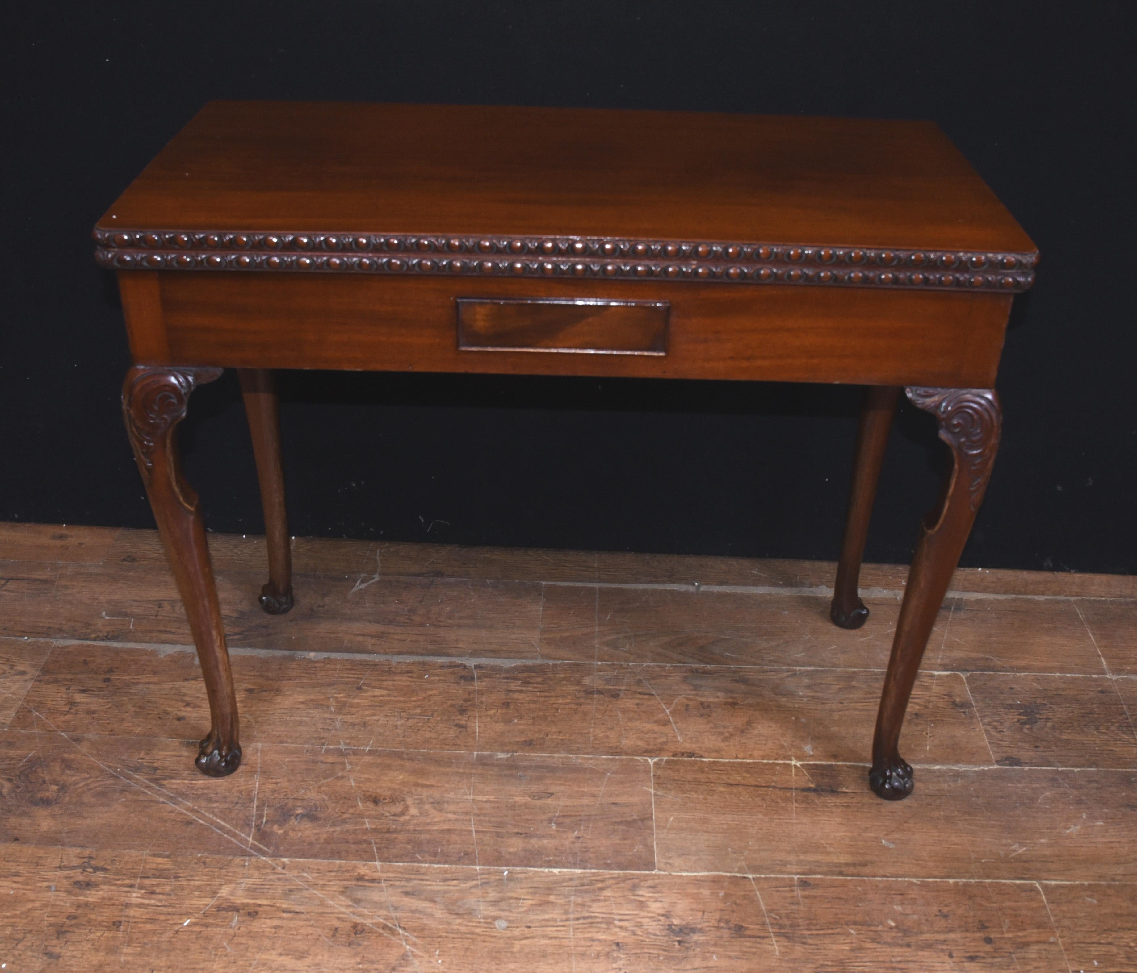 - Georgian style card table Circa 1880 with cabriole legs terminating on ball and claw feet
- Felt base top with recesses for counters and a fine carved border
- Elegant table that can function decoratively as well as practically for all you poker