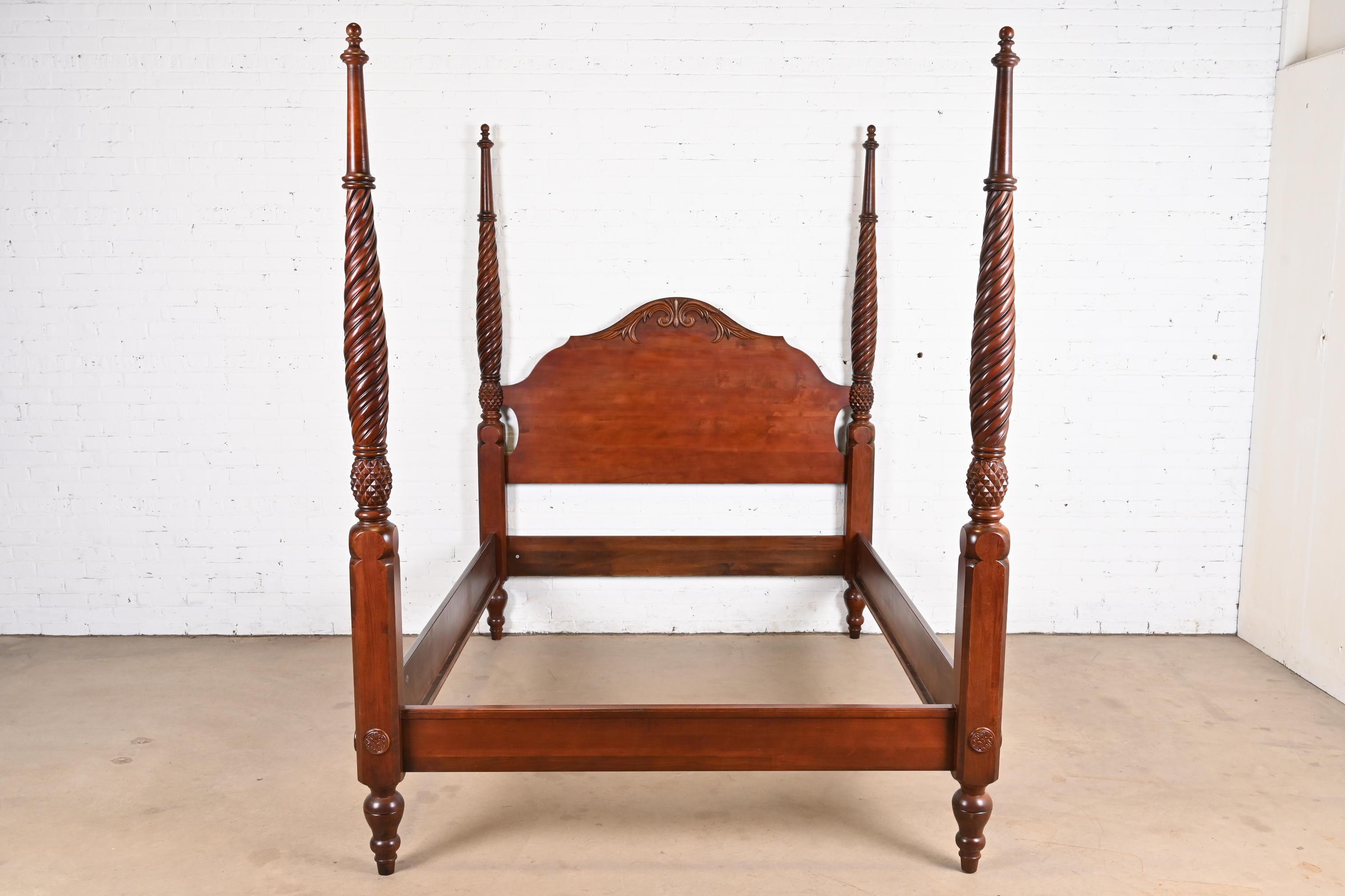 A gorgeous Georgian or Chippendale style carved solid cherry wood four poster queen size bed

USA, Late 20th Century

Measures: 67
