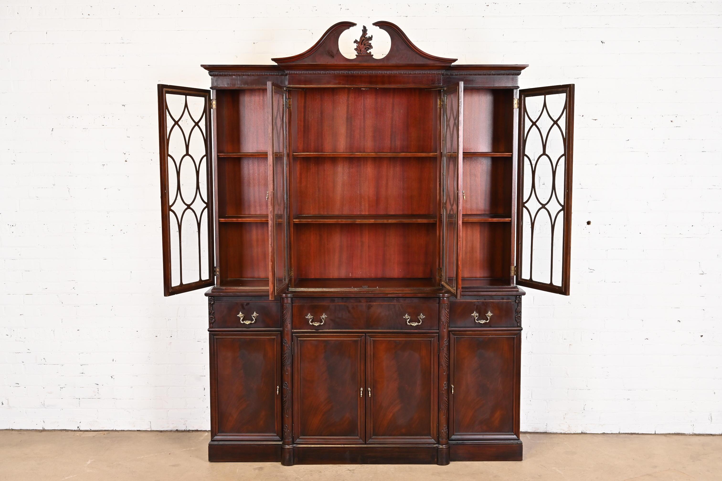 Mid-20th Century Georgian Carved Flame Mahogany Breakfront Bookcase Cabinet With Secretary Desk For Sale