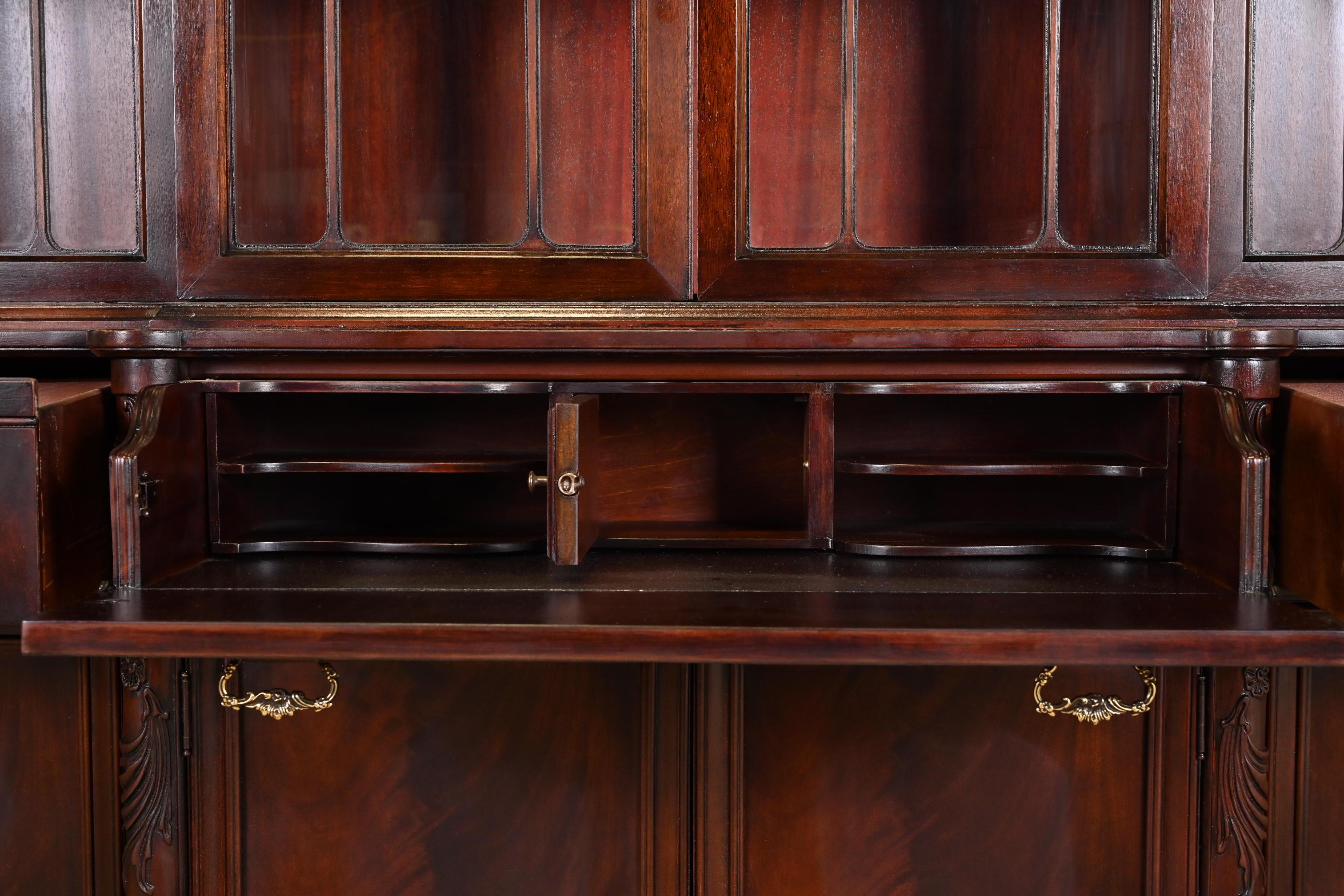 Georgian Carved Flame Mahogany Breakfront Bookcase Cabinet With Secretary Desk For Sale 1